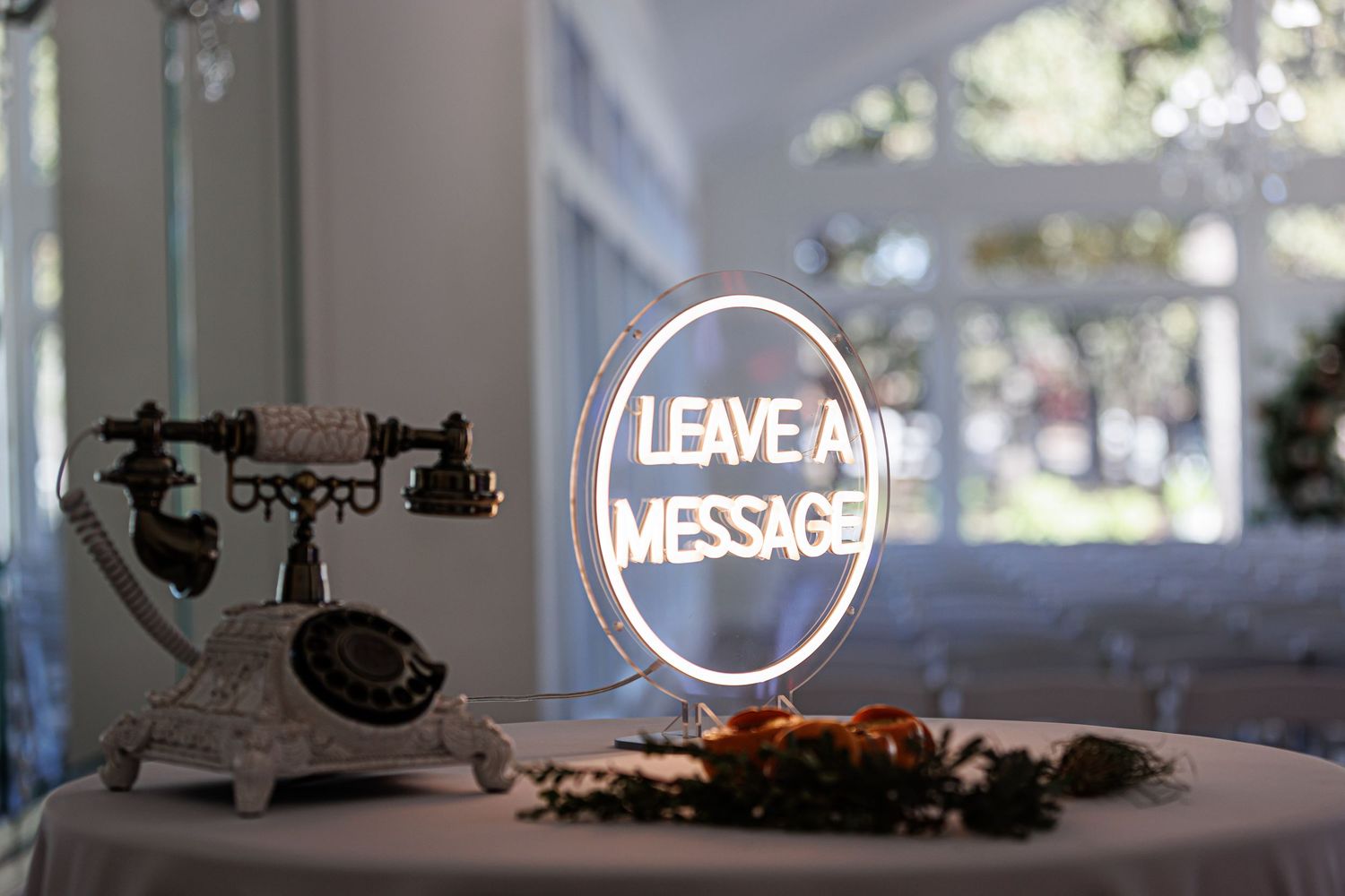 leave a message neon sign by phone to leave voicemails for the couple on their wedding day
