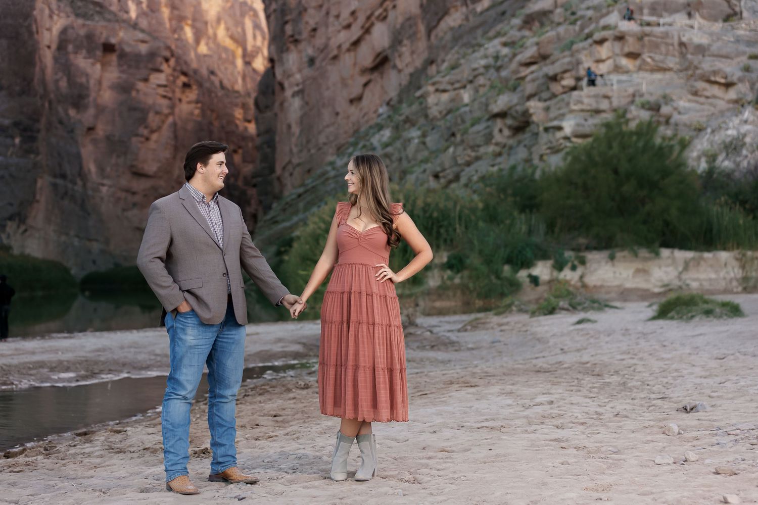 newly engaged couple in casual attire on the rio grand river in big bend national park at Santa Elana canyon