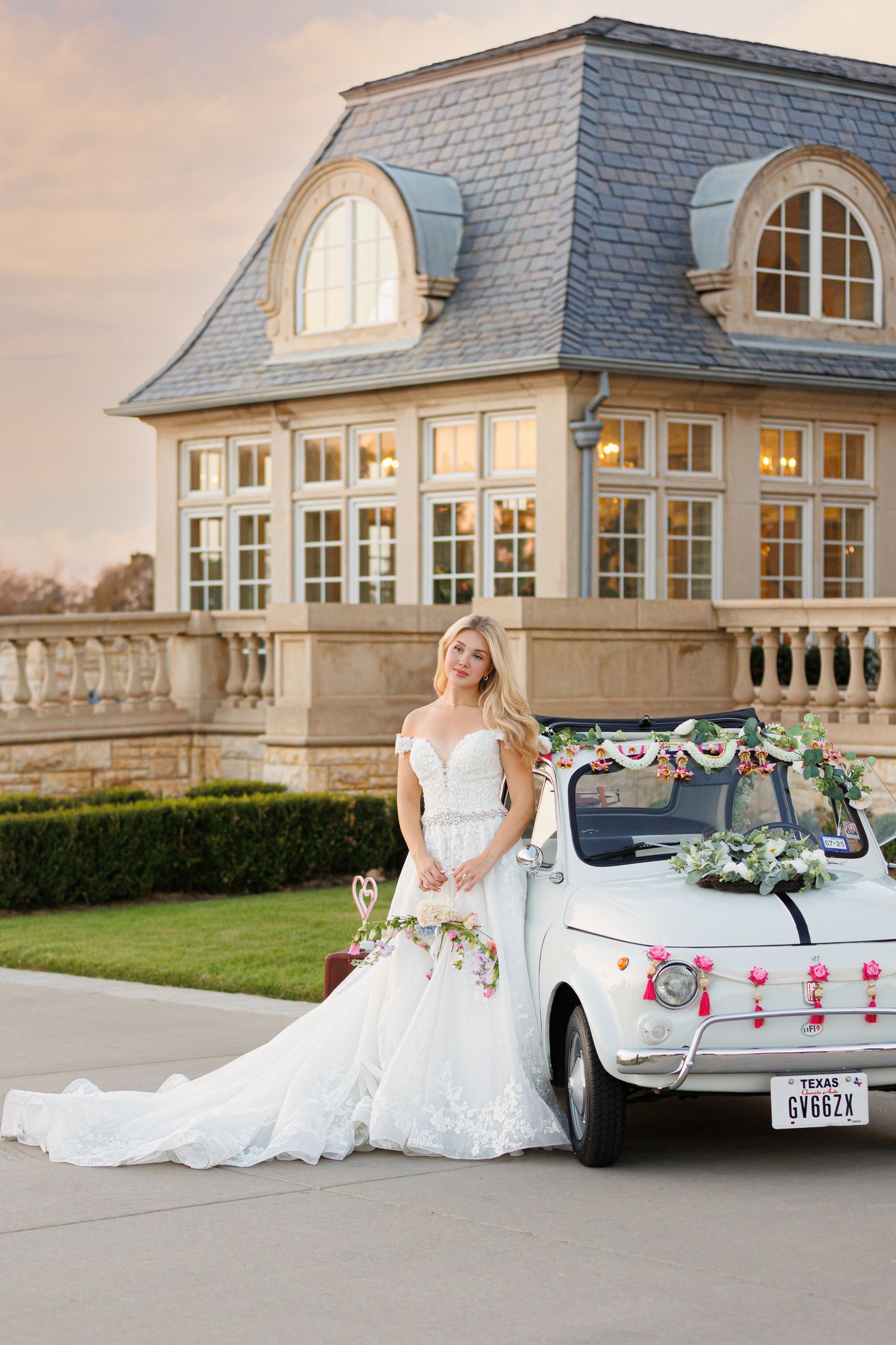 Bridal portait on the lawn at sunset of the Olana with white vintage Italian fiat decorated
