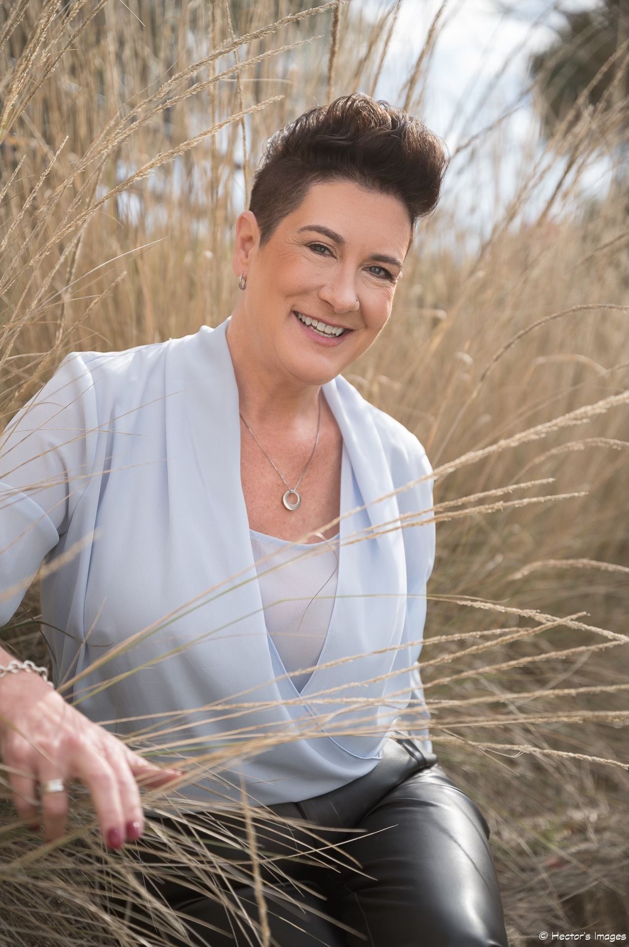 Carrie Reneau Spivey primary photographer, owner of fox and vine weddings, certified professional photographer, master photographer with PPA