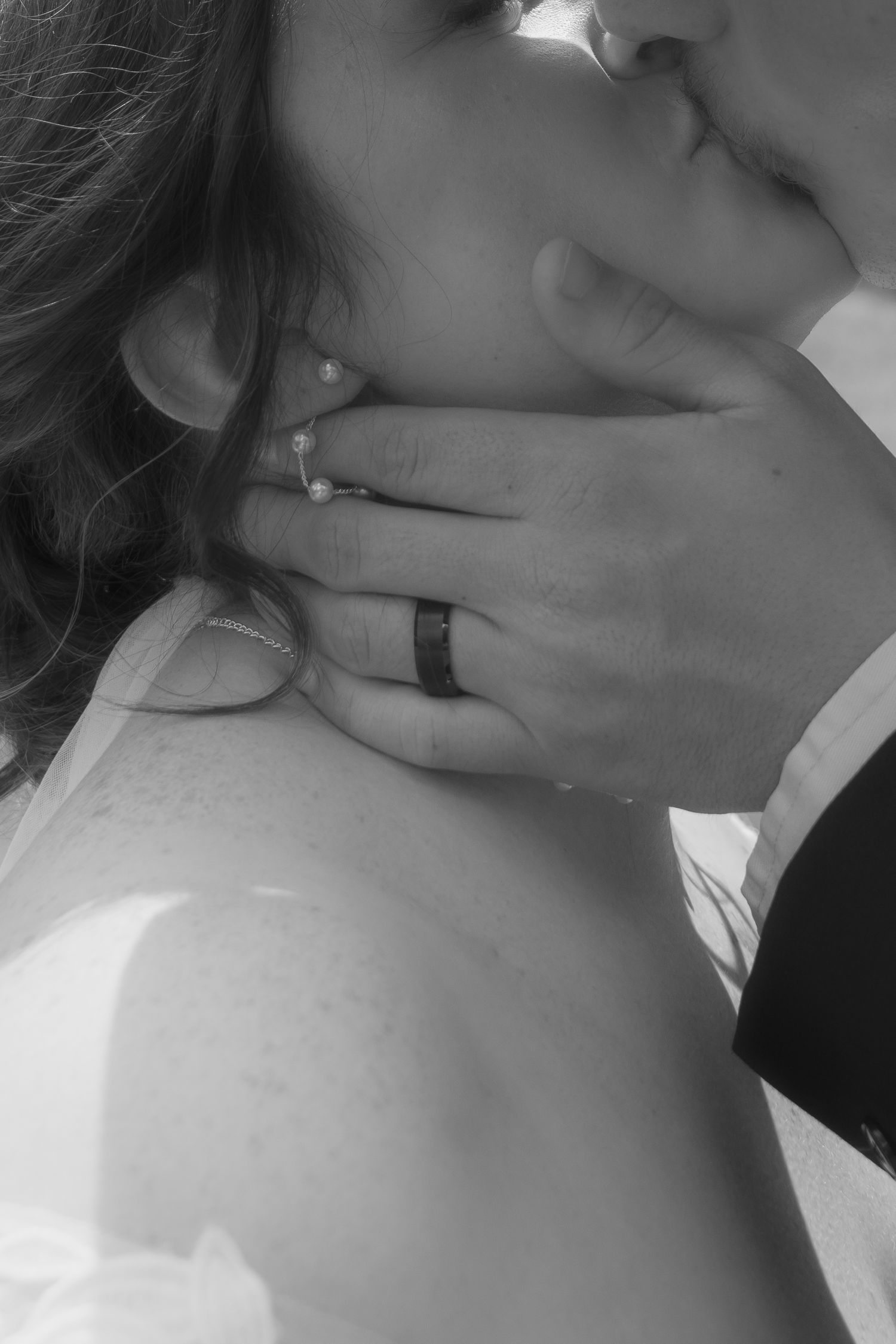 Artistic black and white close-up photo showing jewelry details. wedding photographer Syracuse