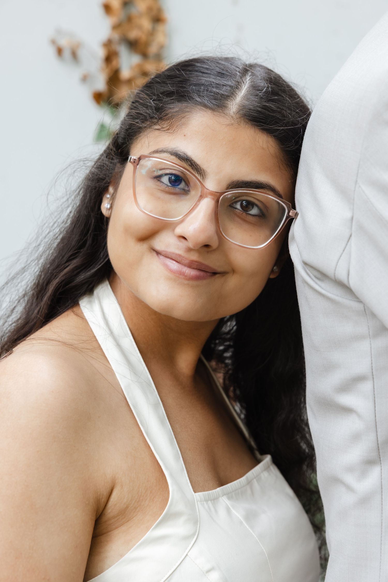 Close-up portrait series in soft lighting against a white background.  Rochester conservatory wedding photographer