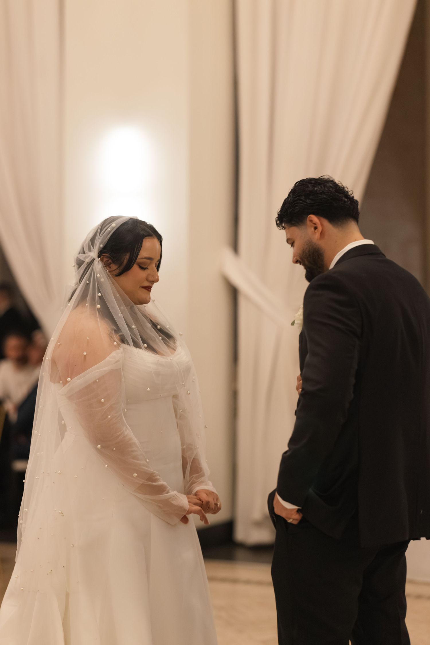 Elegant wedding ceremony sequence showing couple in white dress and black suit. Arbor Midtown wedding photographer
