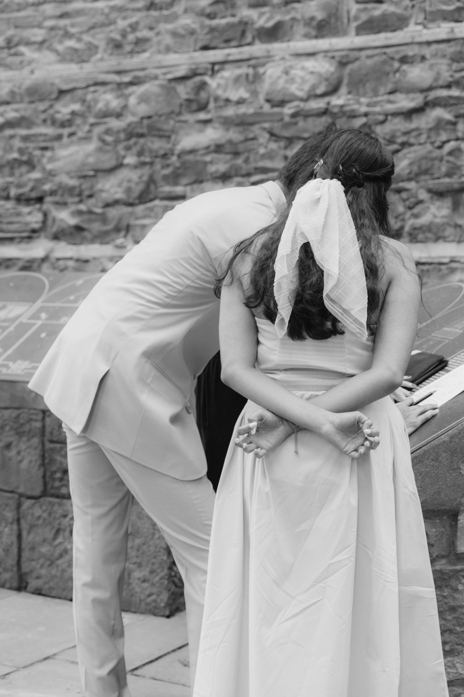 Intimate moment captured in black and white during outdoor wedding ceremony.  St. Josephs park wedding photographer