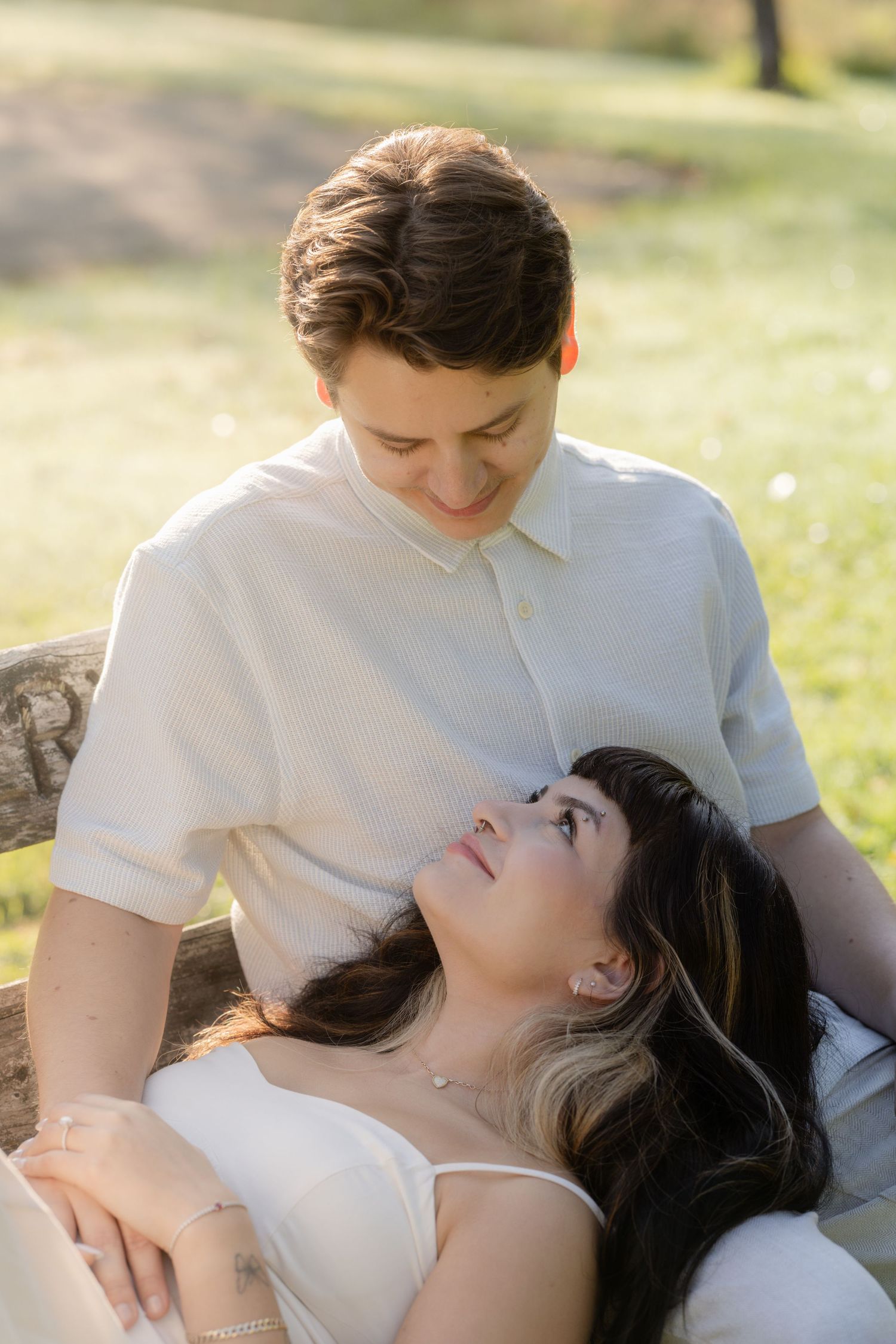 Romantic outdoor couple portrait in soft natural lighting wearing white attire. Film wedding photographer Rochester  NY