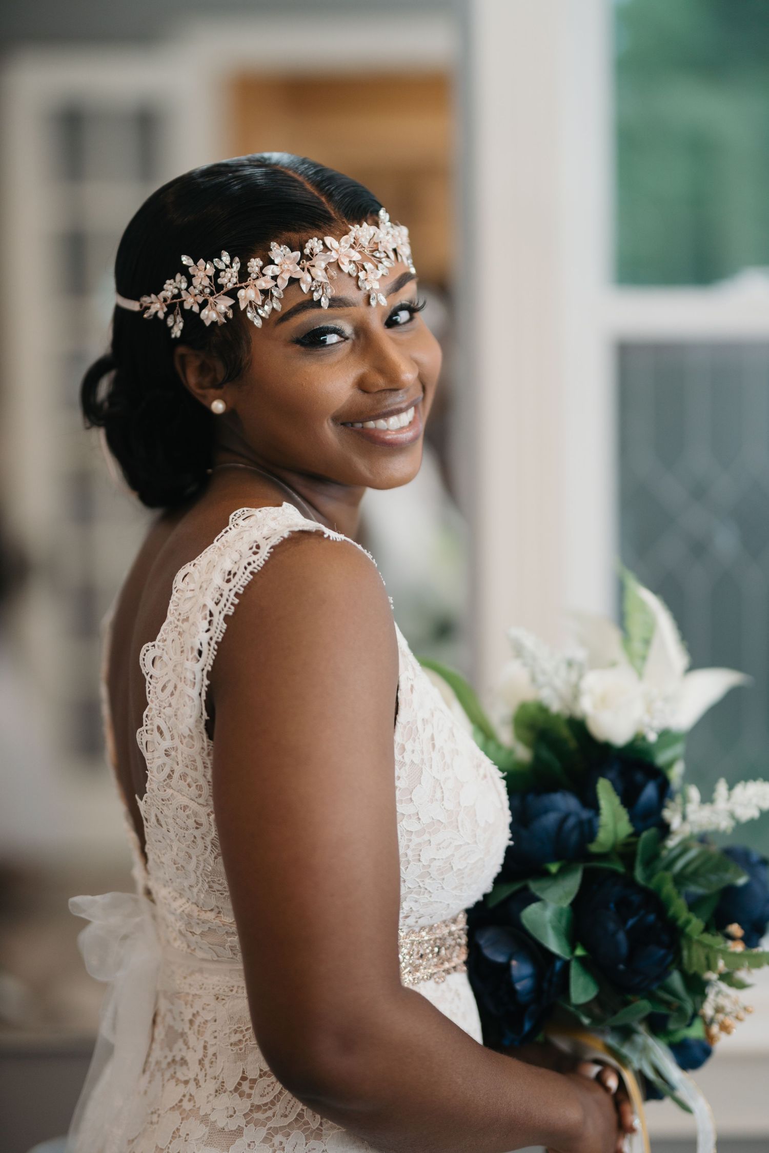 Elegant Black bride portrait with floral headpiece Austin wedding photographer - bridal detail photography