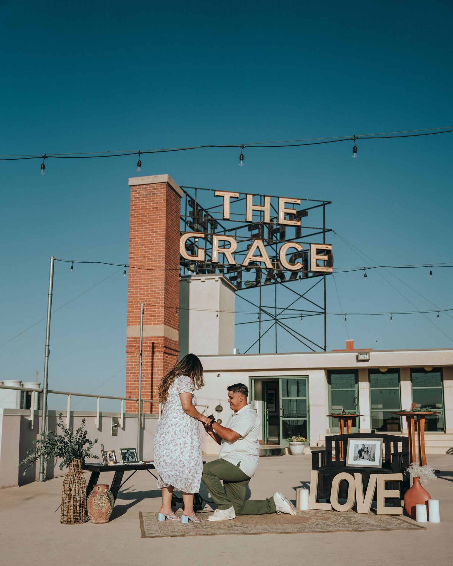 Urban downtown engagement session Austin Texas - couple at The Grace venue neon sign