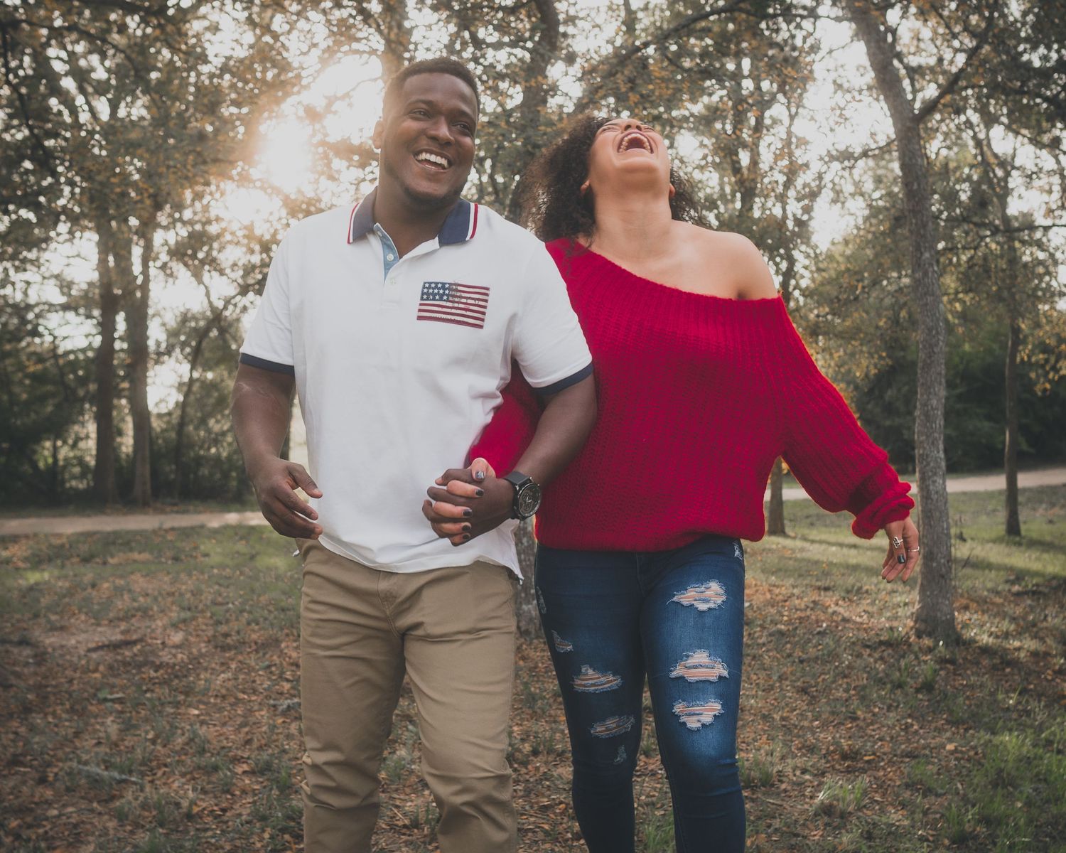 Candid couple laughing outdoor park session Round Rock Texas - authentic engagement photography