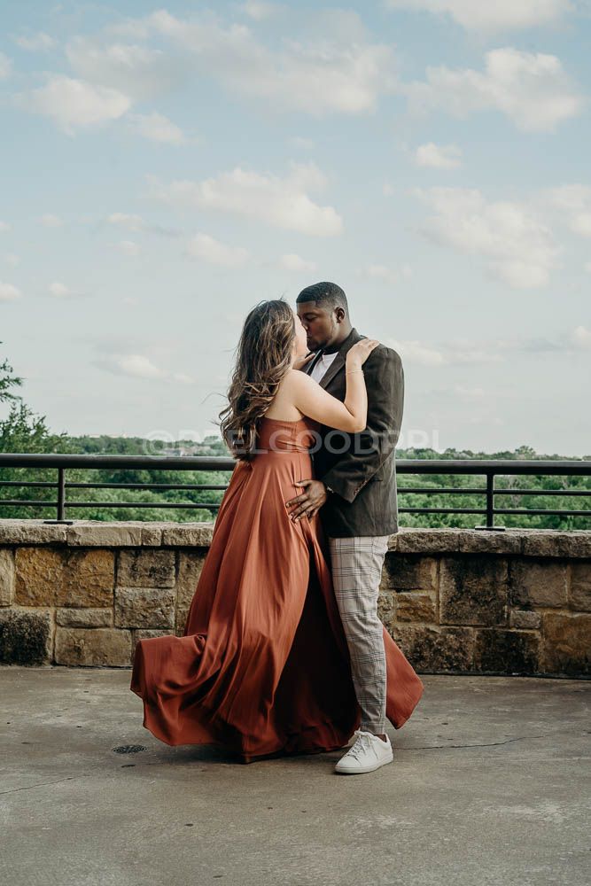 Interracial couple proposal moment Austin - Black and Asian engagement photographer Texas