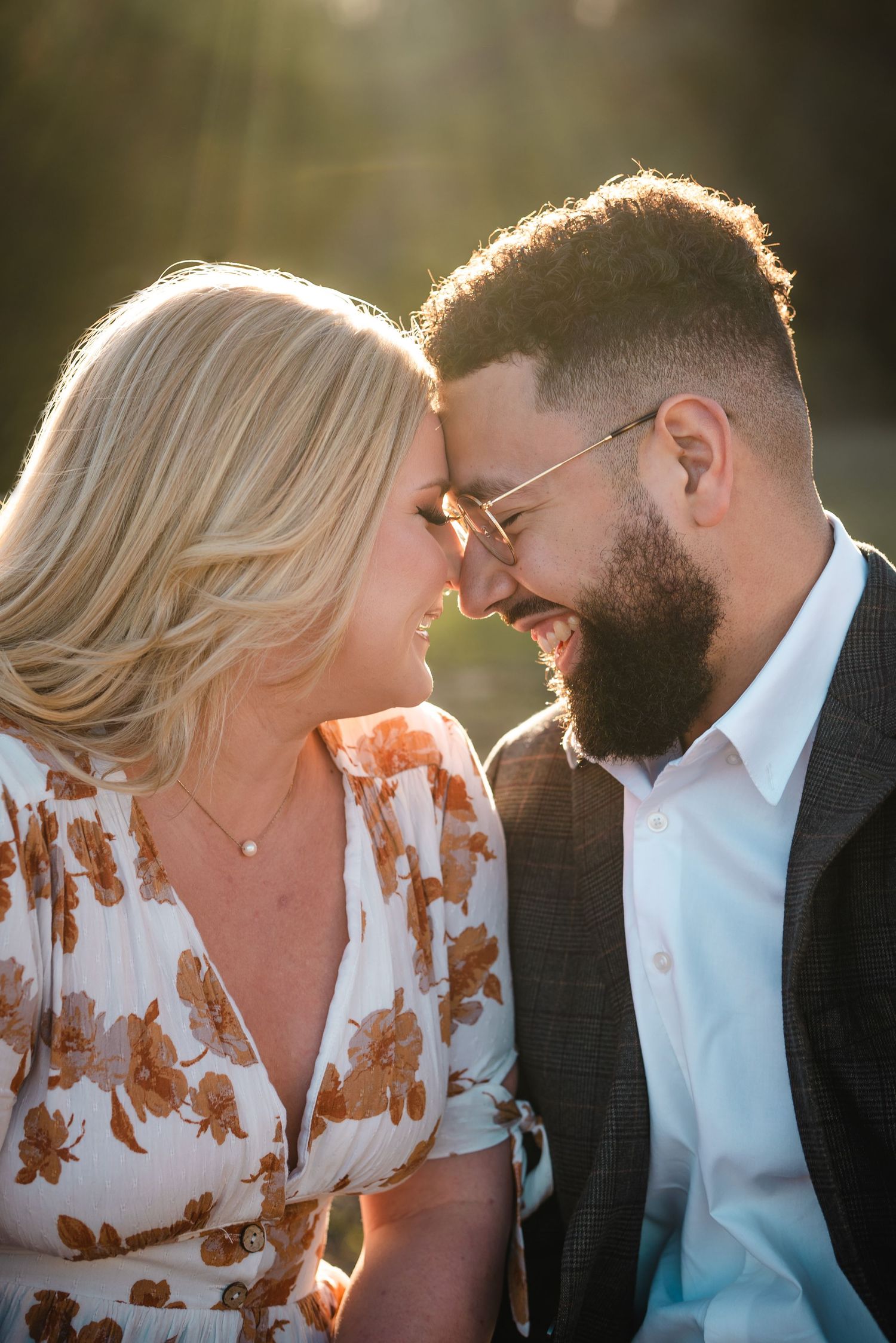 Intimate golden hour engagement portrait Austin Texas - romantic couple photography with natural backlight