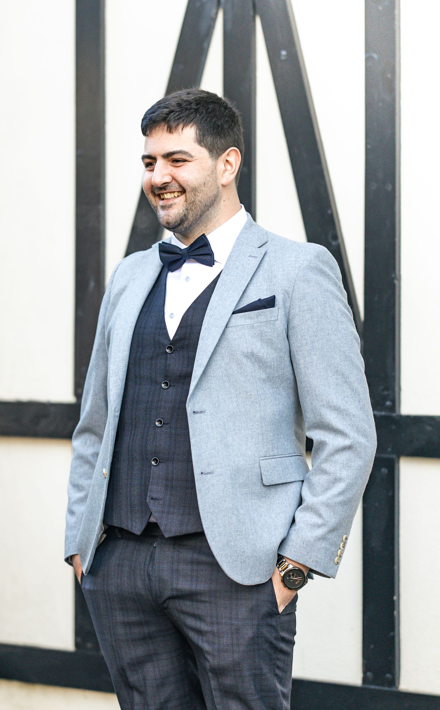 Happy groom-to-be anticipating his wedding day events