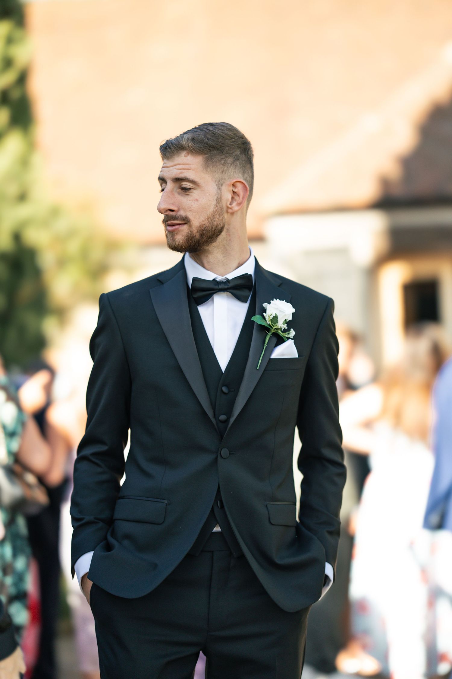 Relaxed groom awaiting his guests arrival