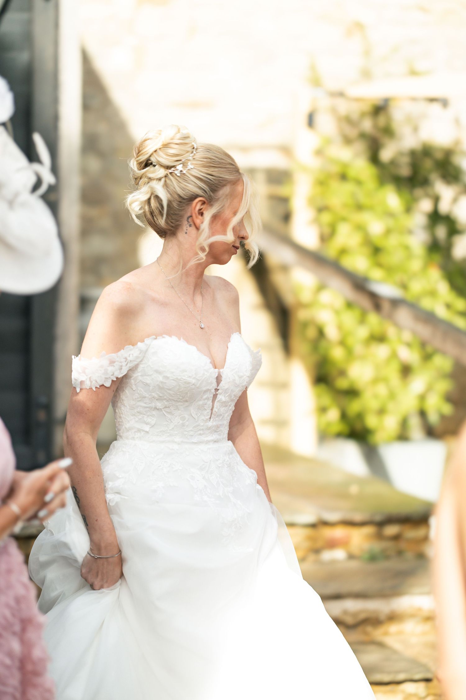 Detailed image of bride's hair and dress during wedding day
