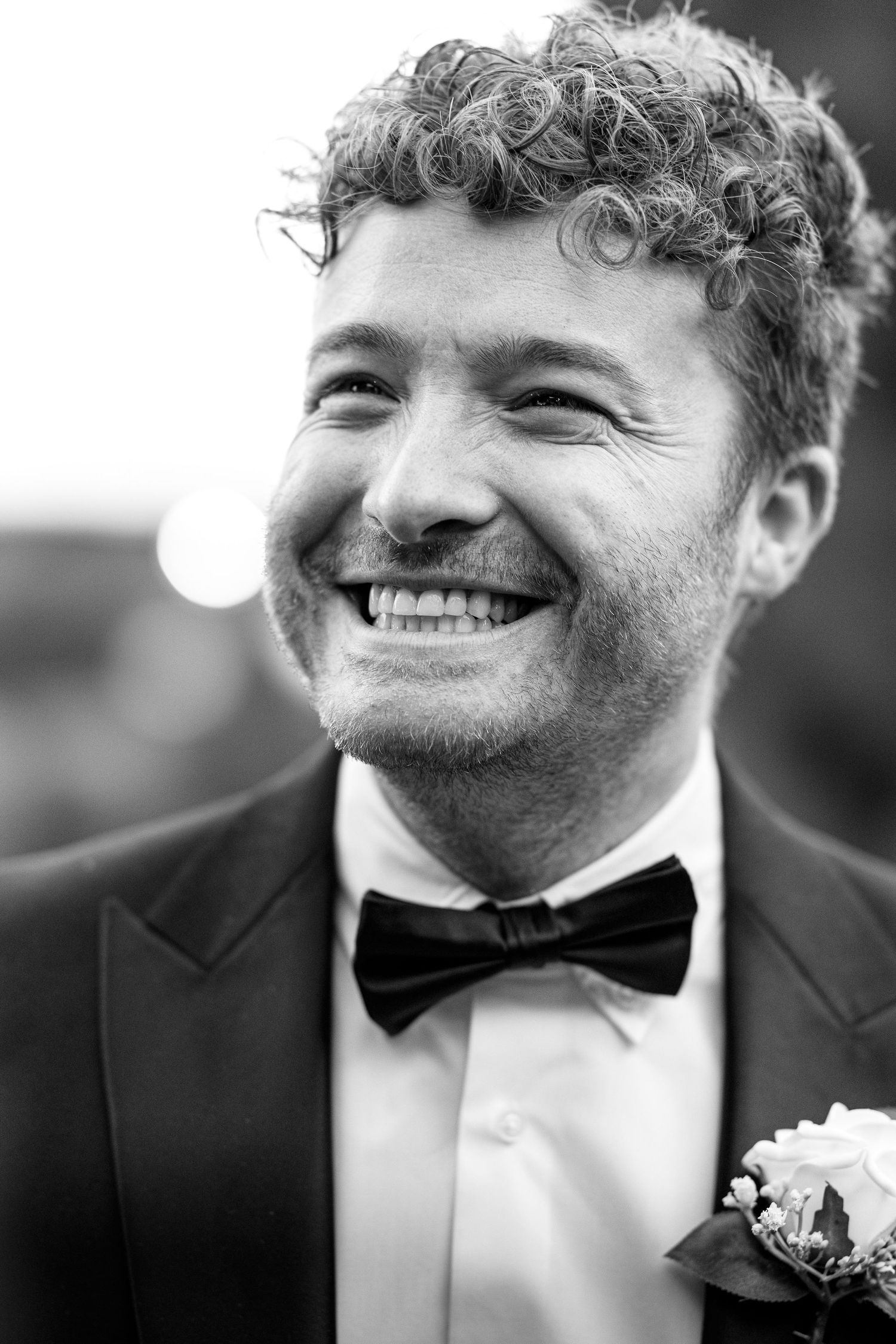 Grinning wedding guest