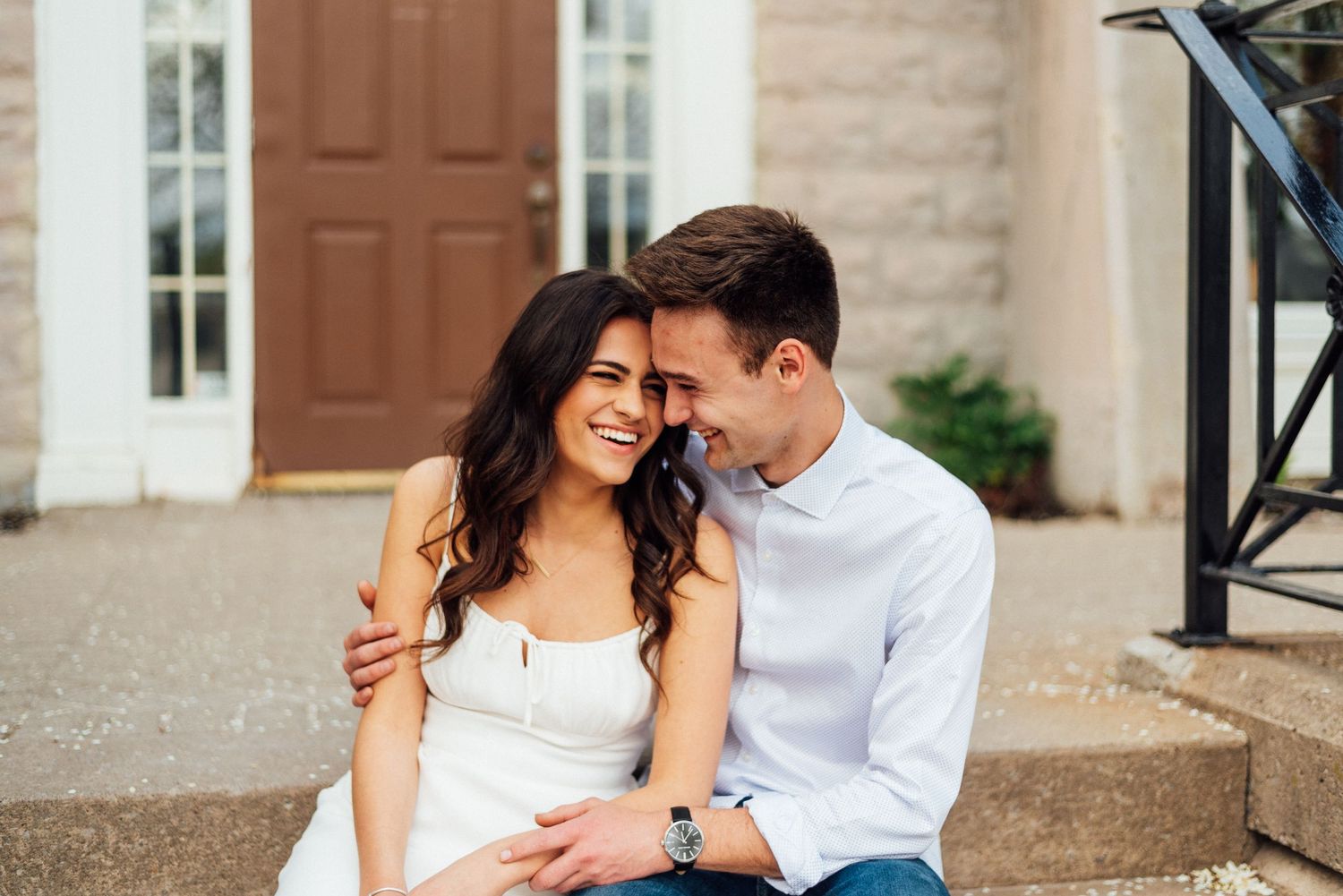 Couple laughing during engagement session