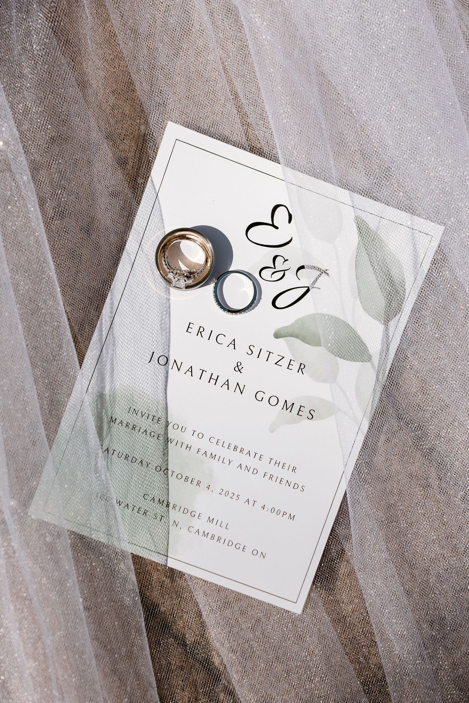 Minimalist wedding invitations with elegant typography and gray tones.