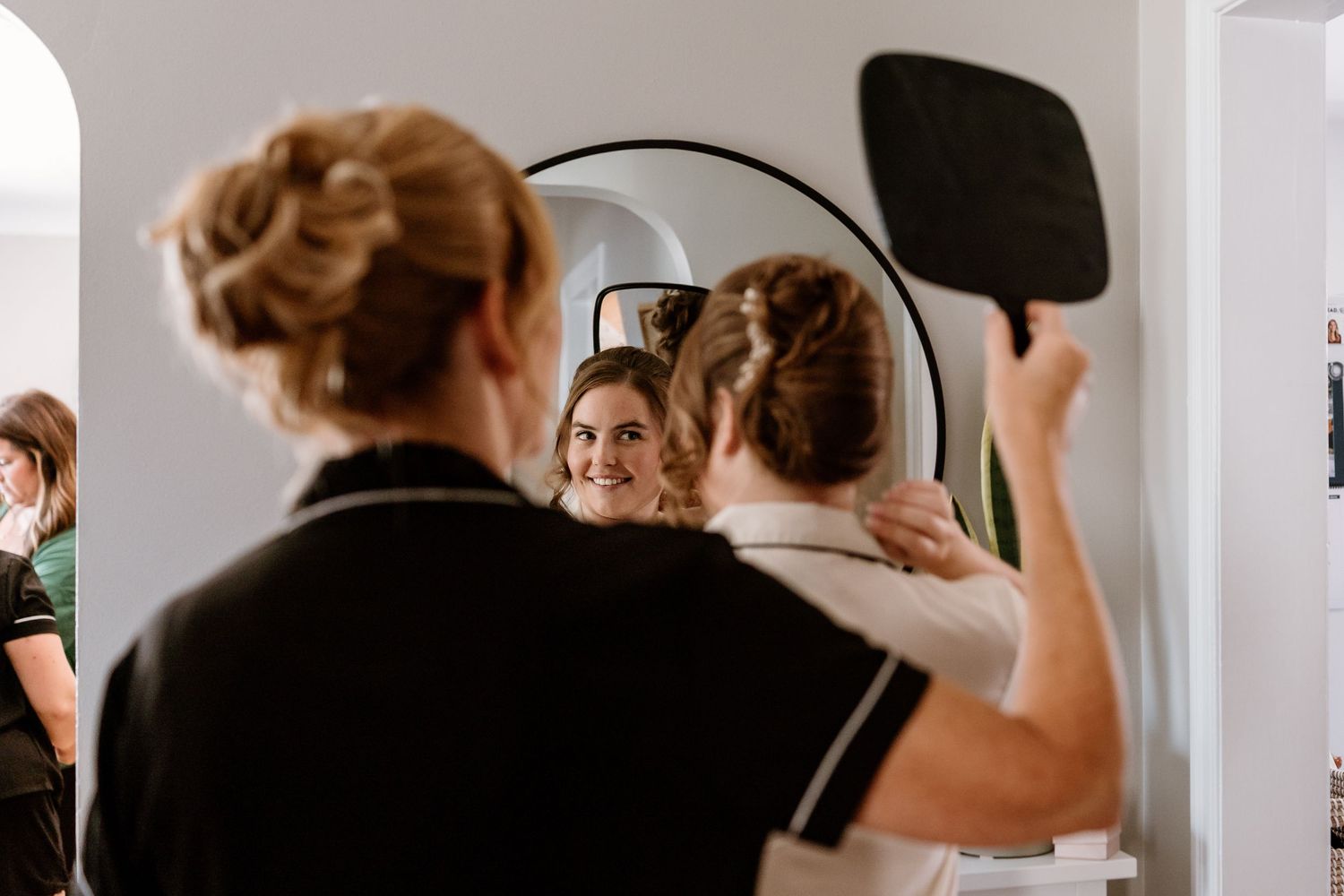 Getting ready scene with beauty preparations in morning light.