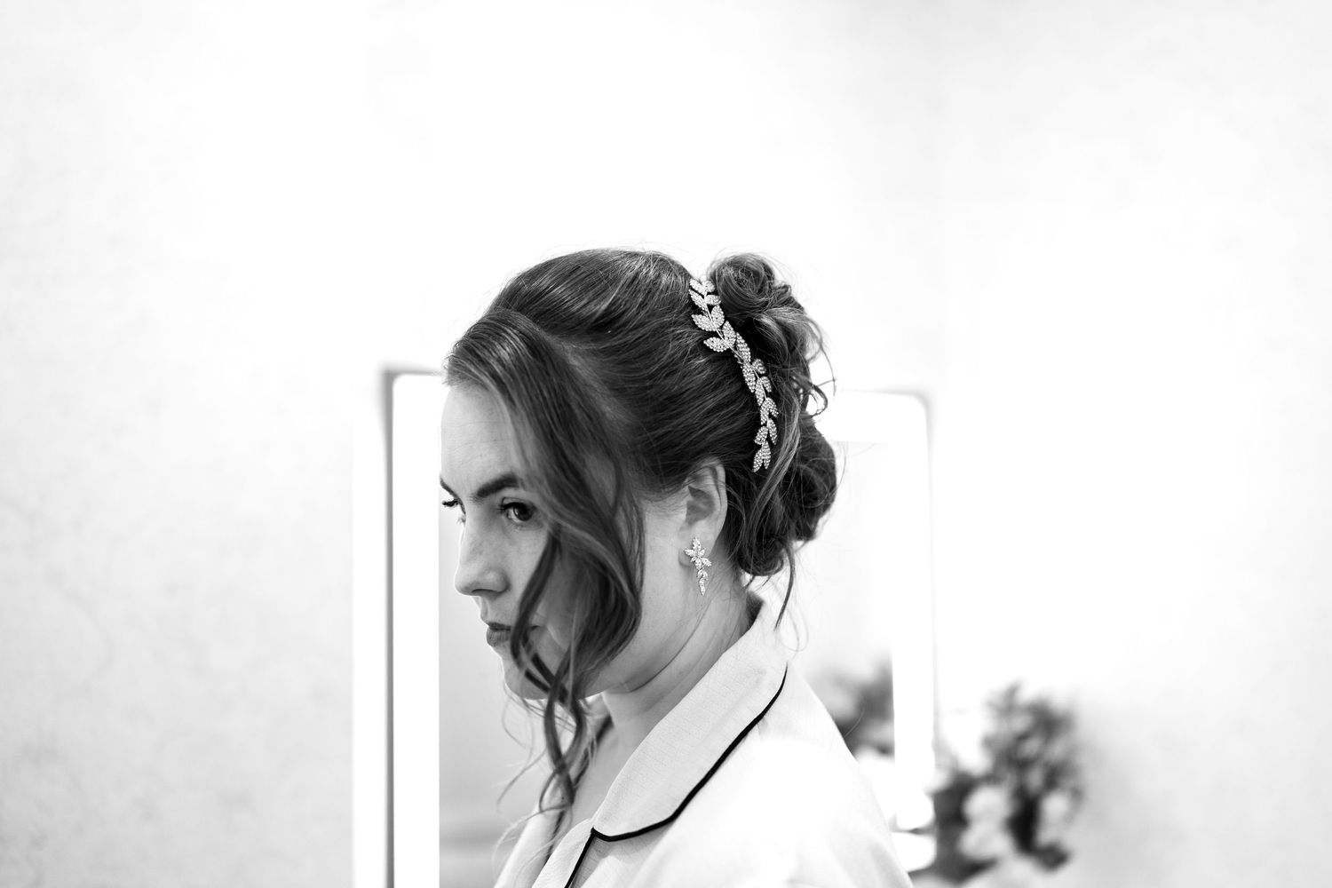 Black and white portraits captured during wedding morning preparations.