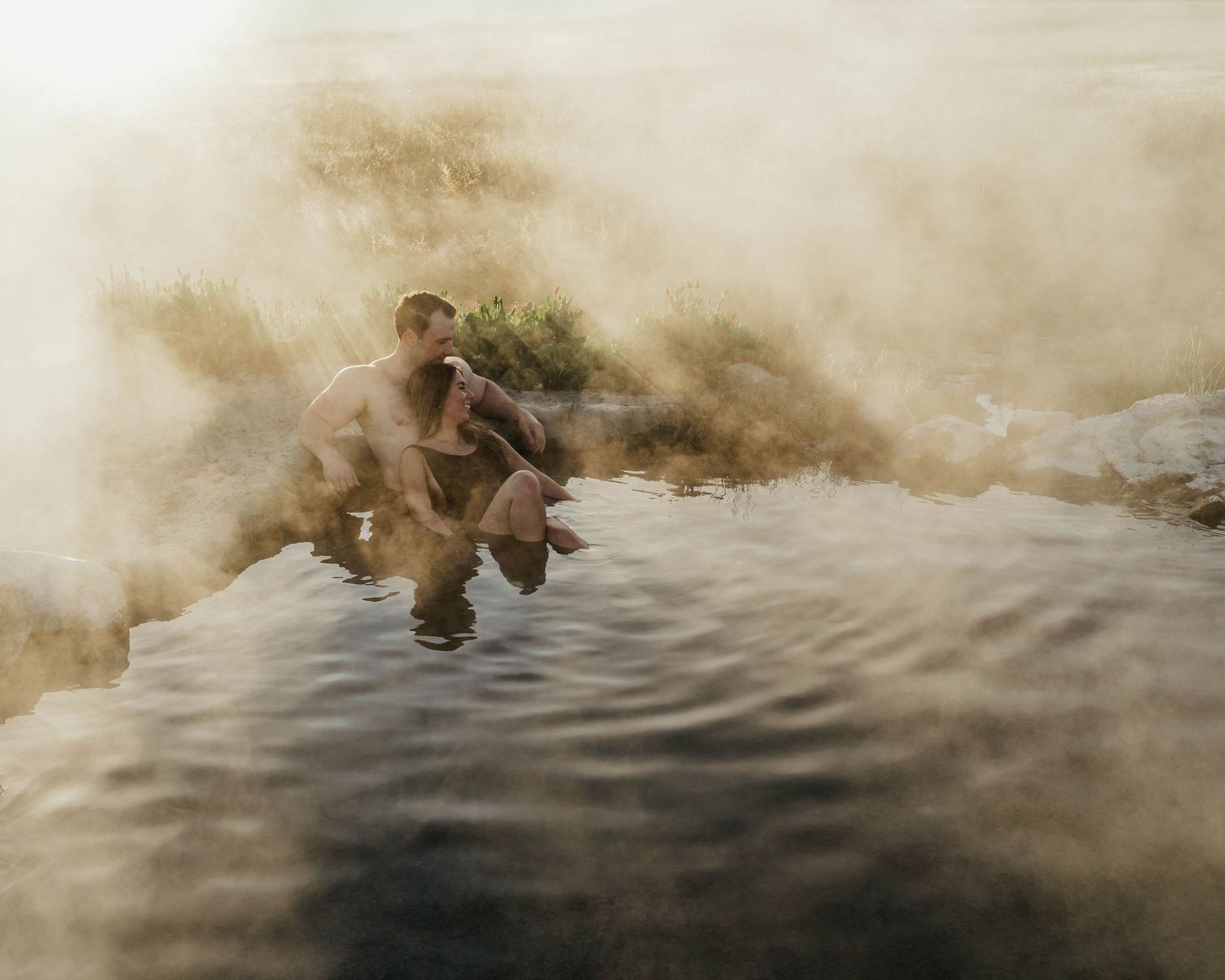 A sequence of photos showing a couple relaxing in a hot spring at dawn creating a dreamy atmospheric scene.