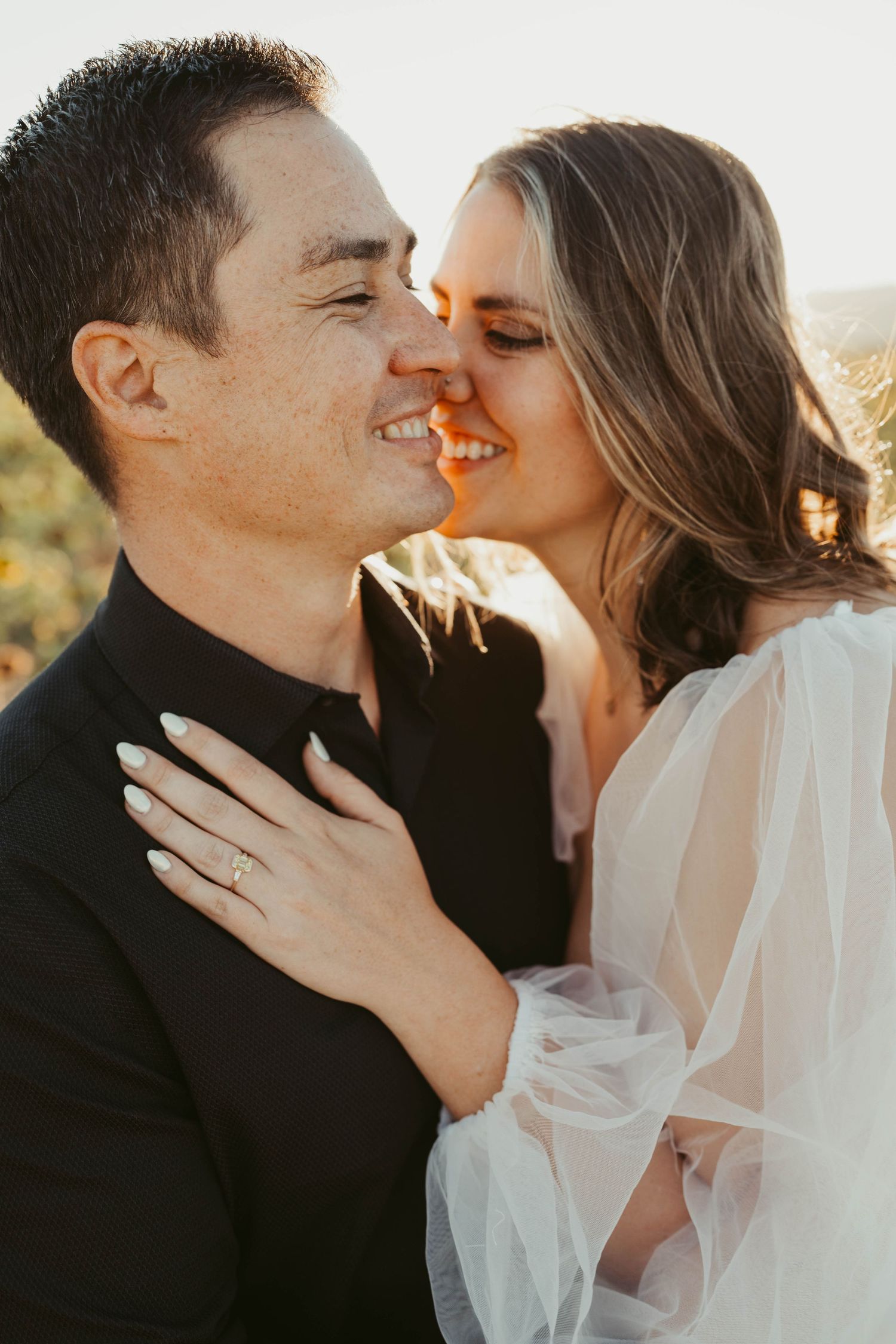 A romantic couple shares intimate kisses in a series of close-up photos with a soft dreamy quality.