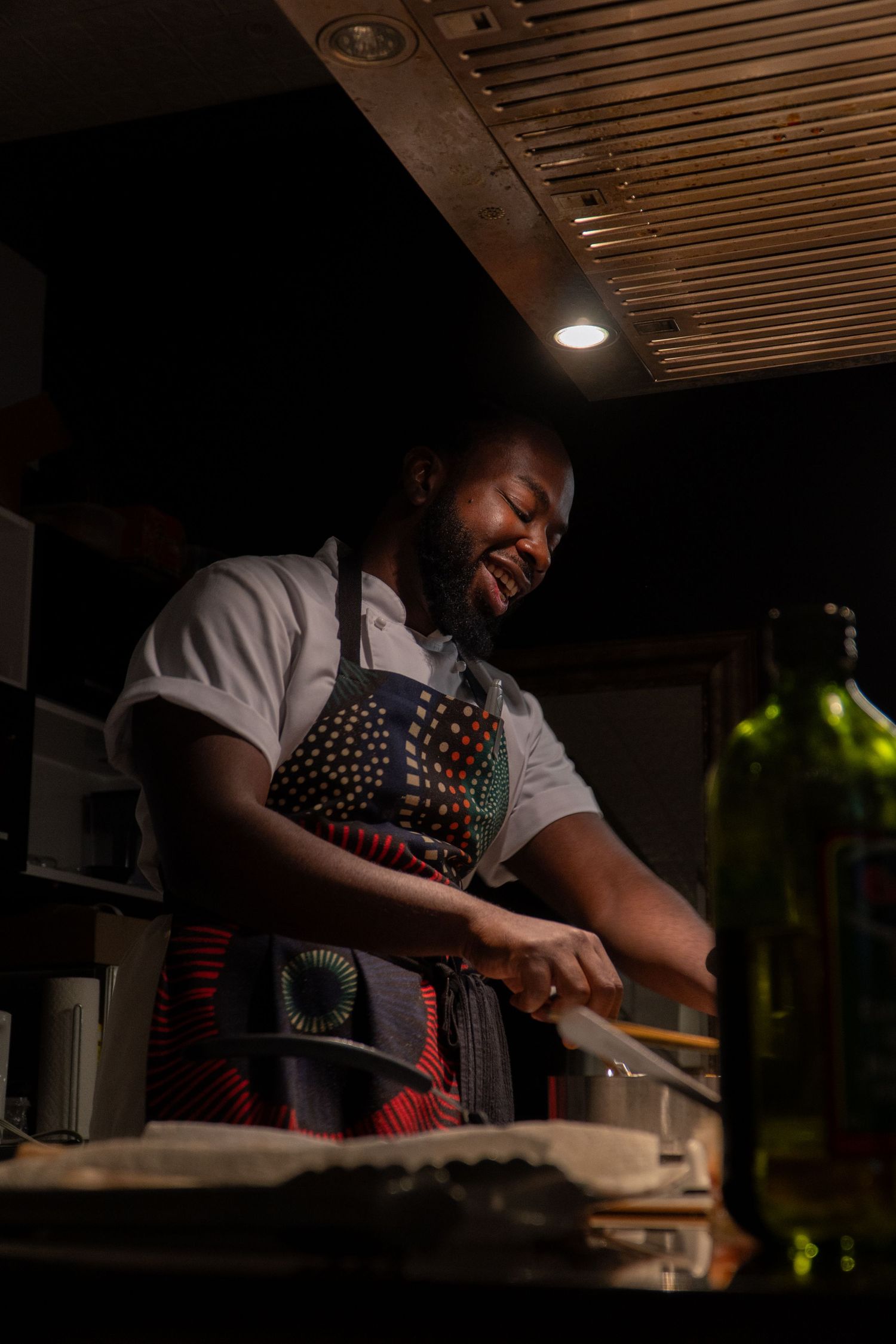 Chef Niyi Brown photographed during an Afro-fusion tasting by Wisely's Mind.