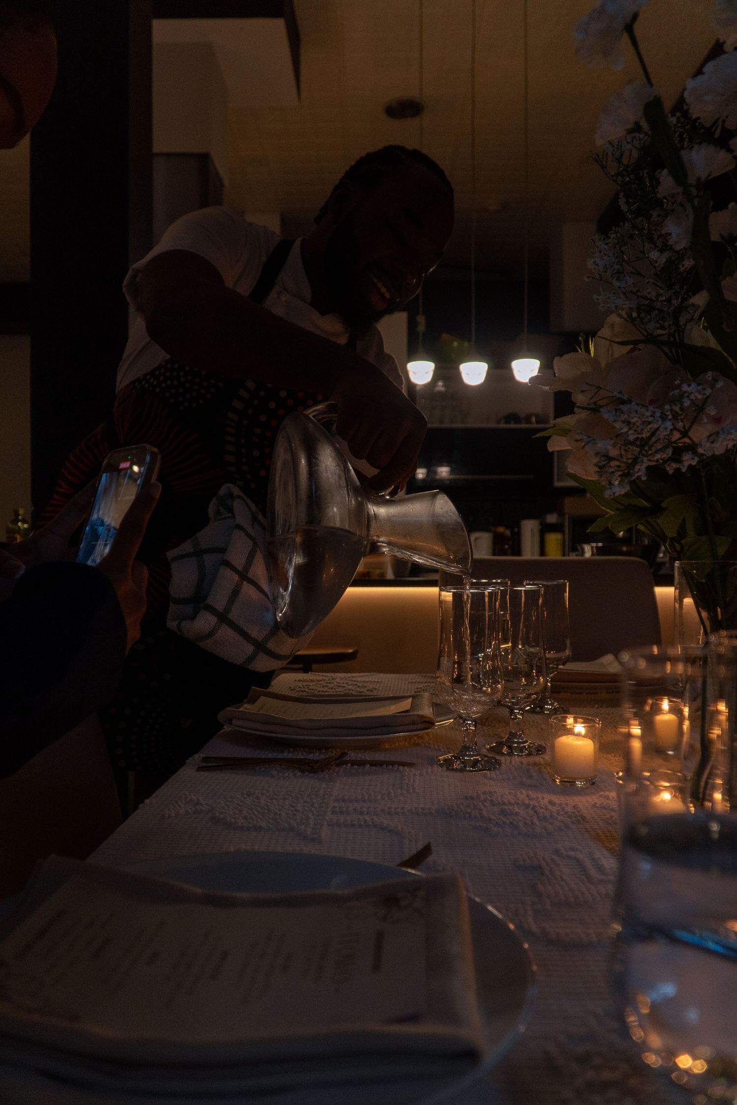 Chef Niyi Brown photographed during an Afro-fusion tasting by Wisely's Mind.