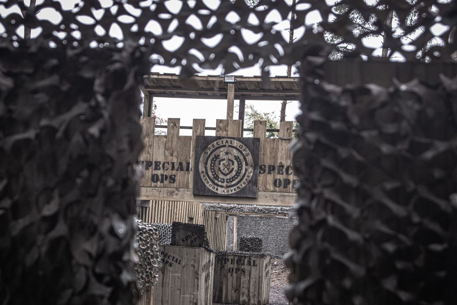 Artistic view through lace curtains of an old building with circular design.