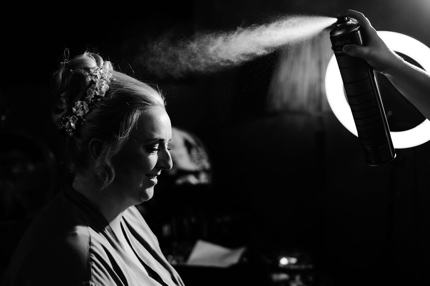Dramatic black and white silhouettes during wedding ceremony.