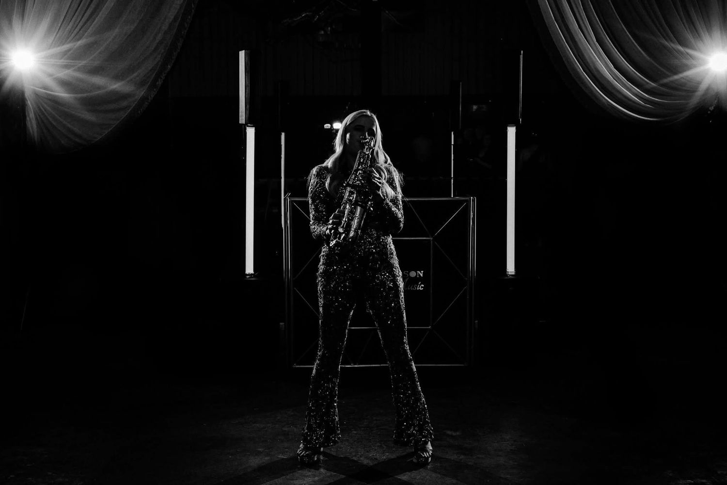 Artistic black and white dance floor photos with dramatic lighting effects.