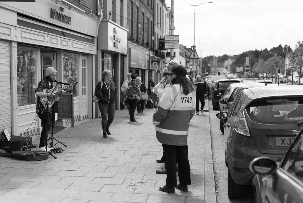 Street wardens in Banbridge are watching the musician.