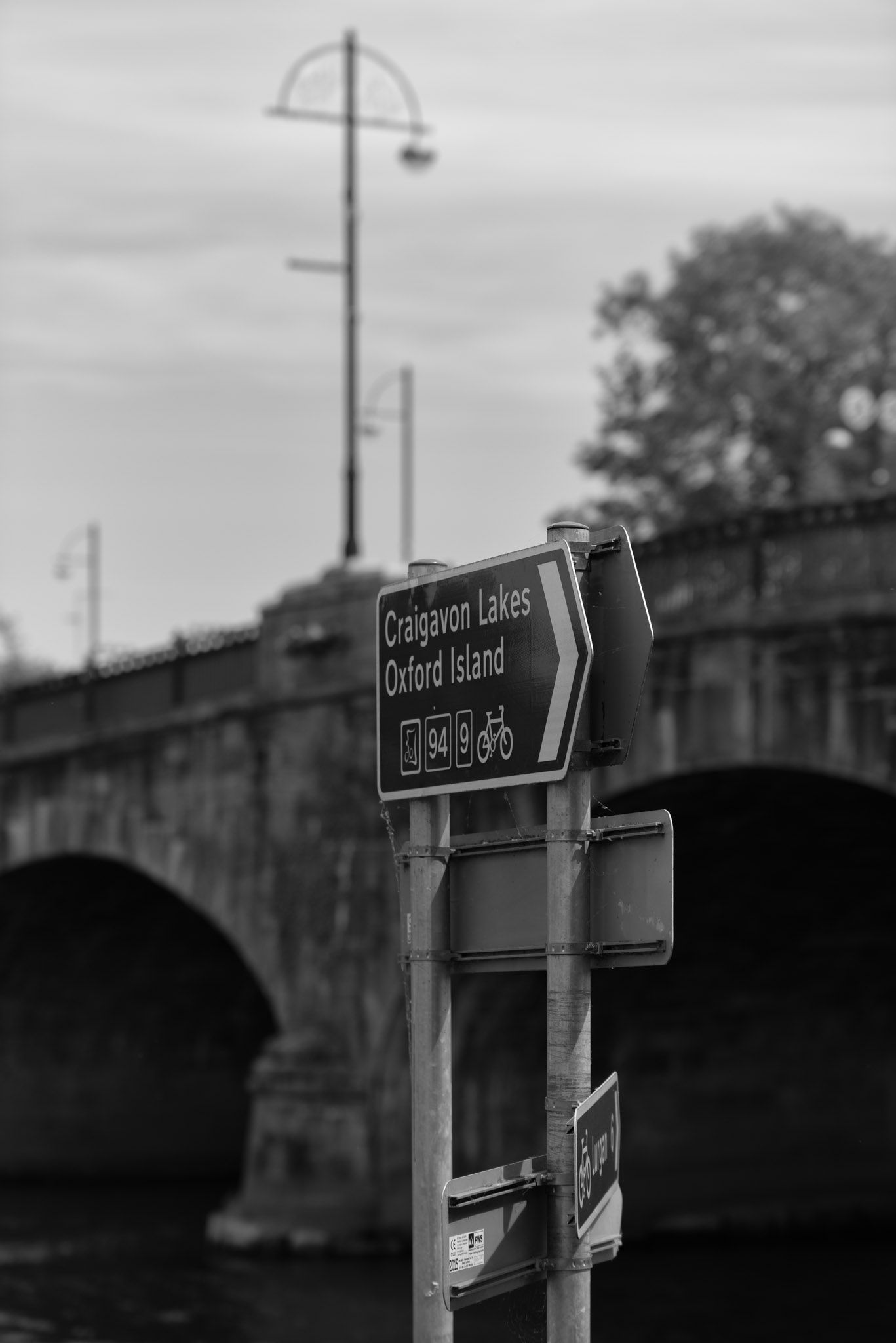 Signage with the Bann Bridge in the background displaying Craigavon Lakes.