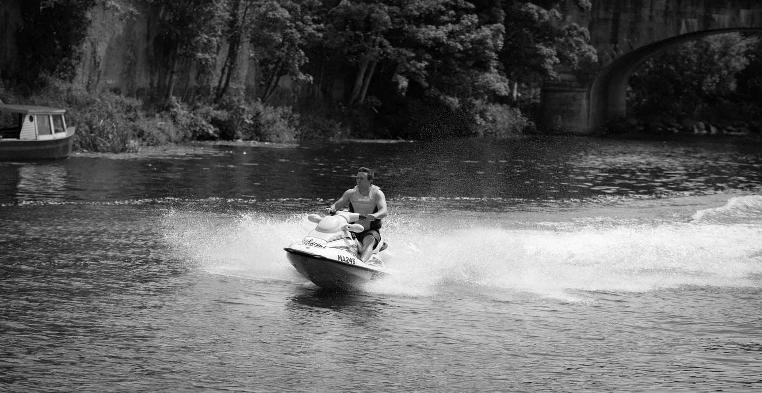 Someone on a jet ski in mono.