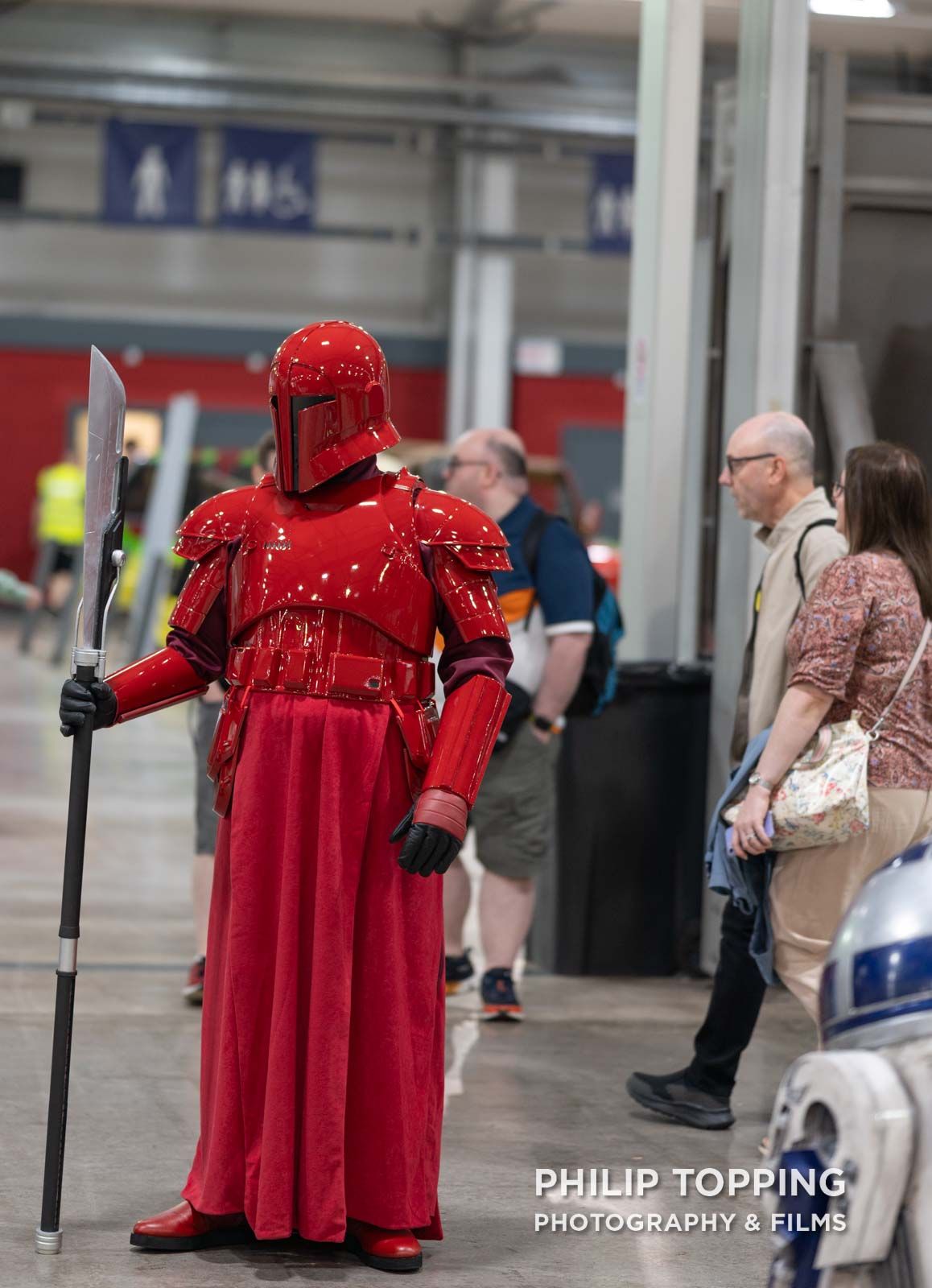 Red cosplayer.