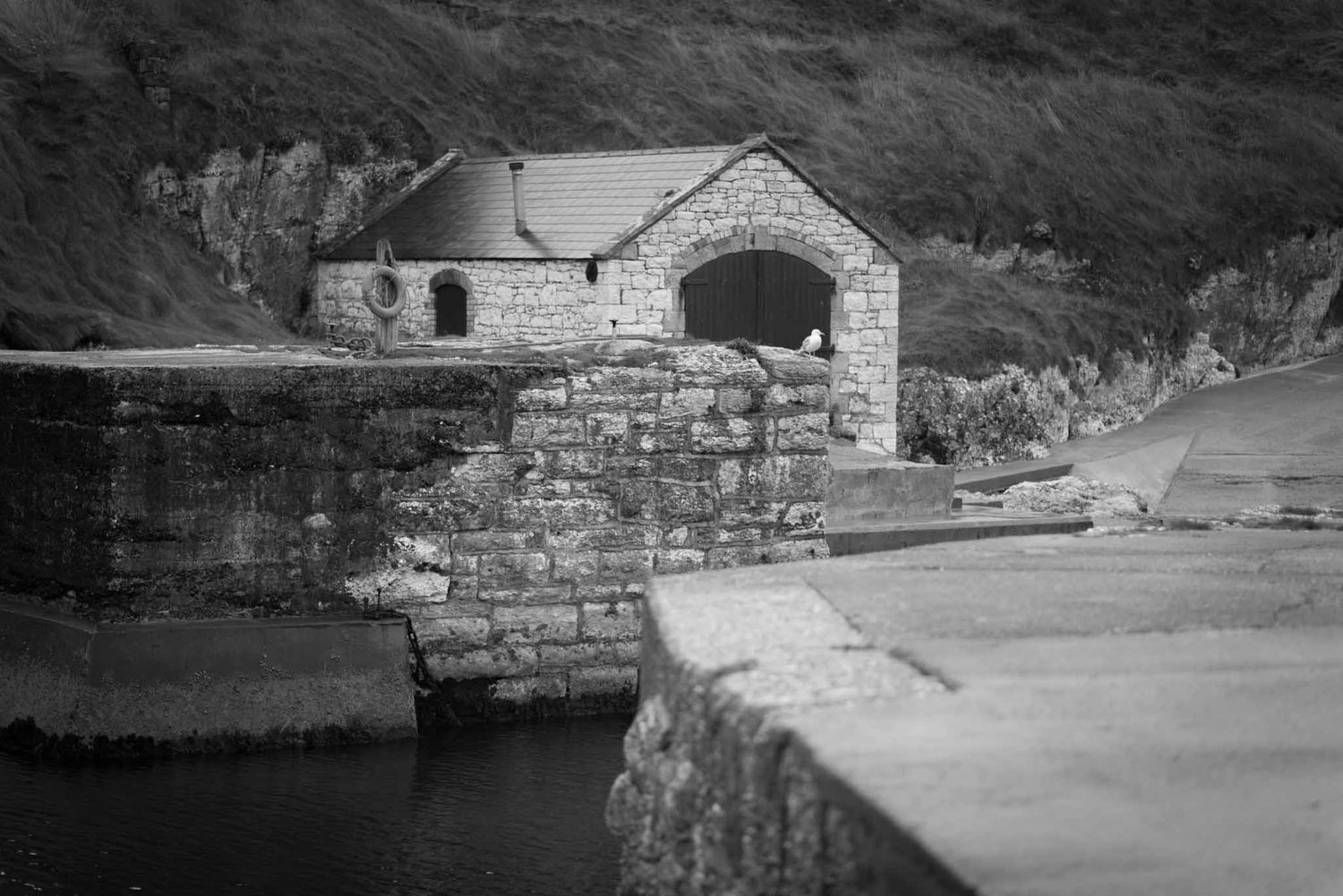 Boat house in the harbour.