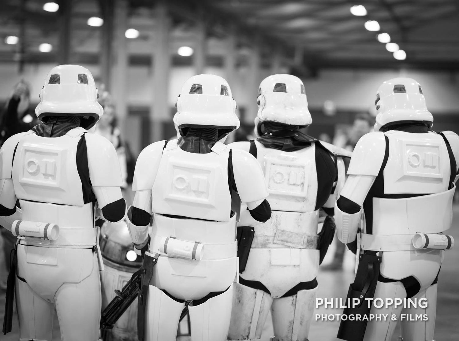 Back of stormtrooper cosplayers.