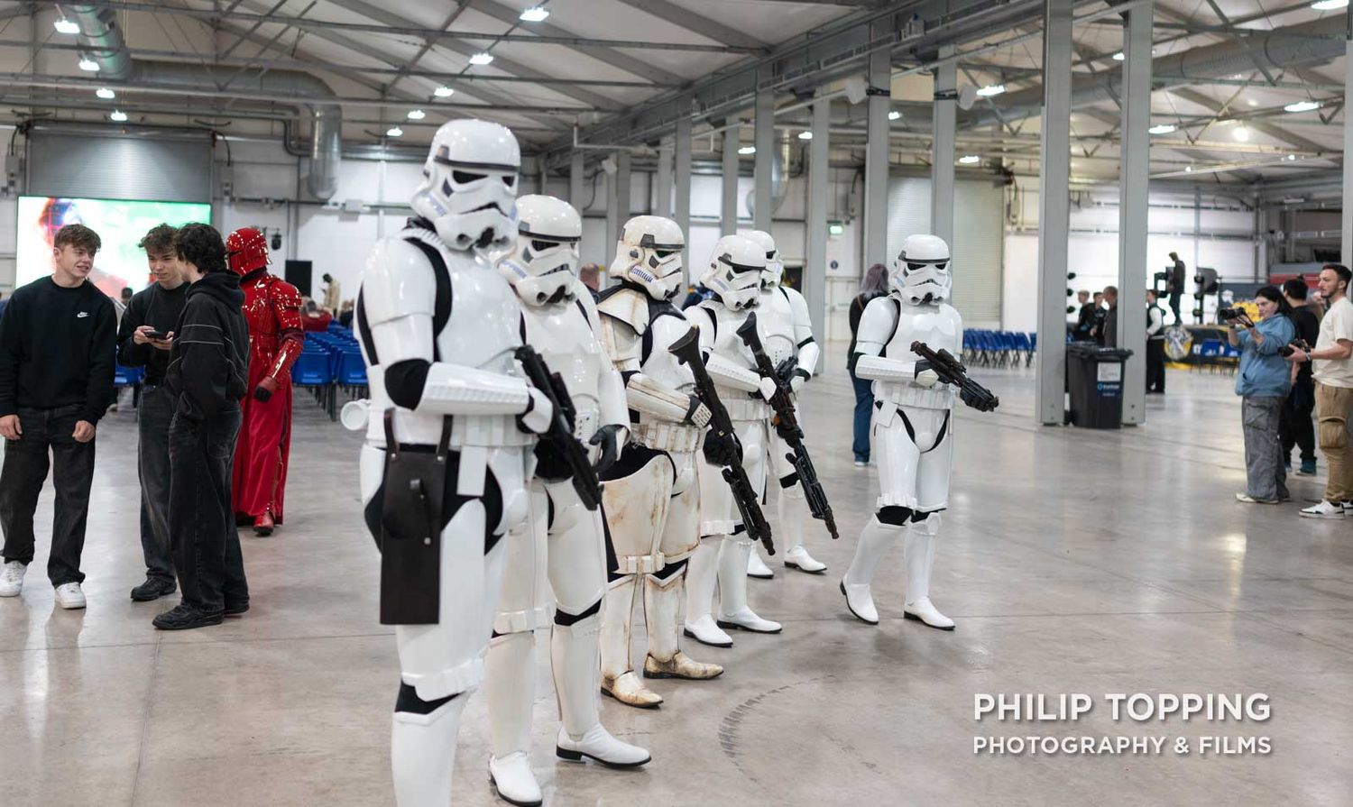 Stormtroopers from Star Wars lined up.
