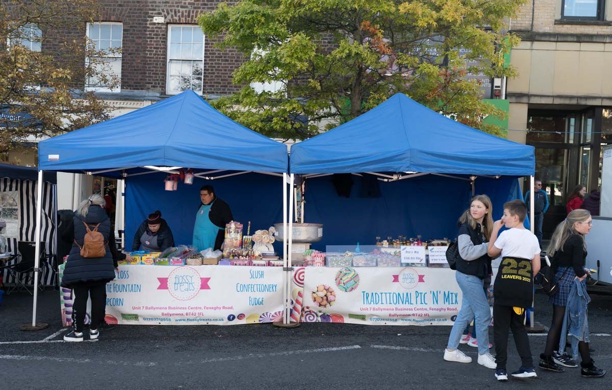 Blue tent stall on High Street.