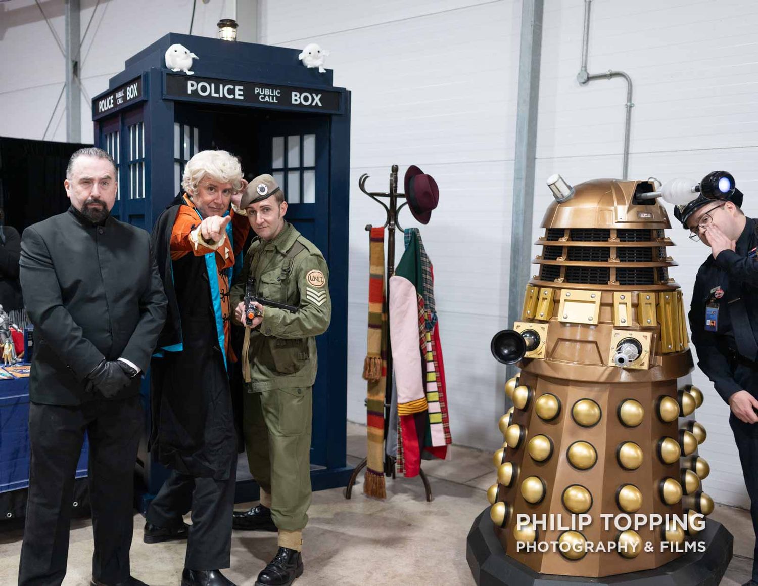 Doctor Who, Dalek, The Master and an army soldier in front of the Tardis.