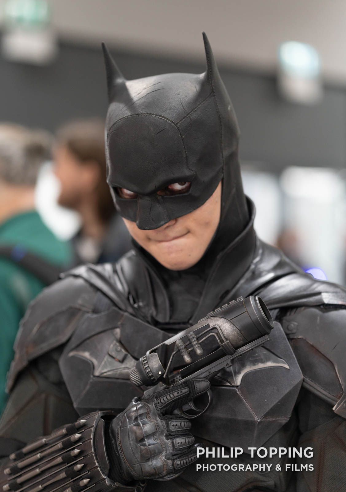 The Batman cosplayer with a grapple gun.