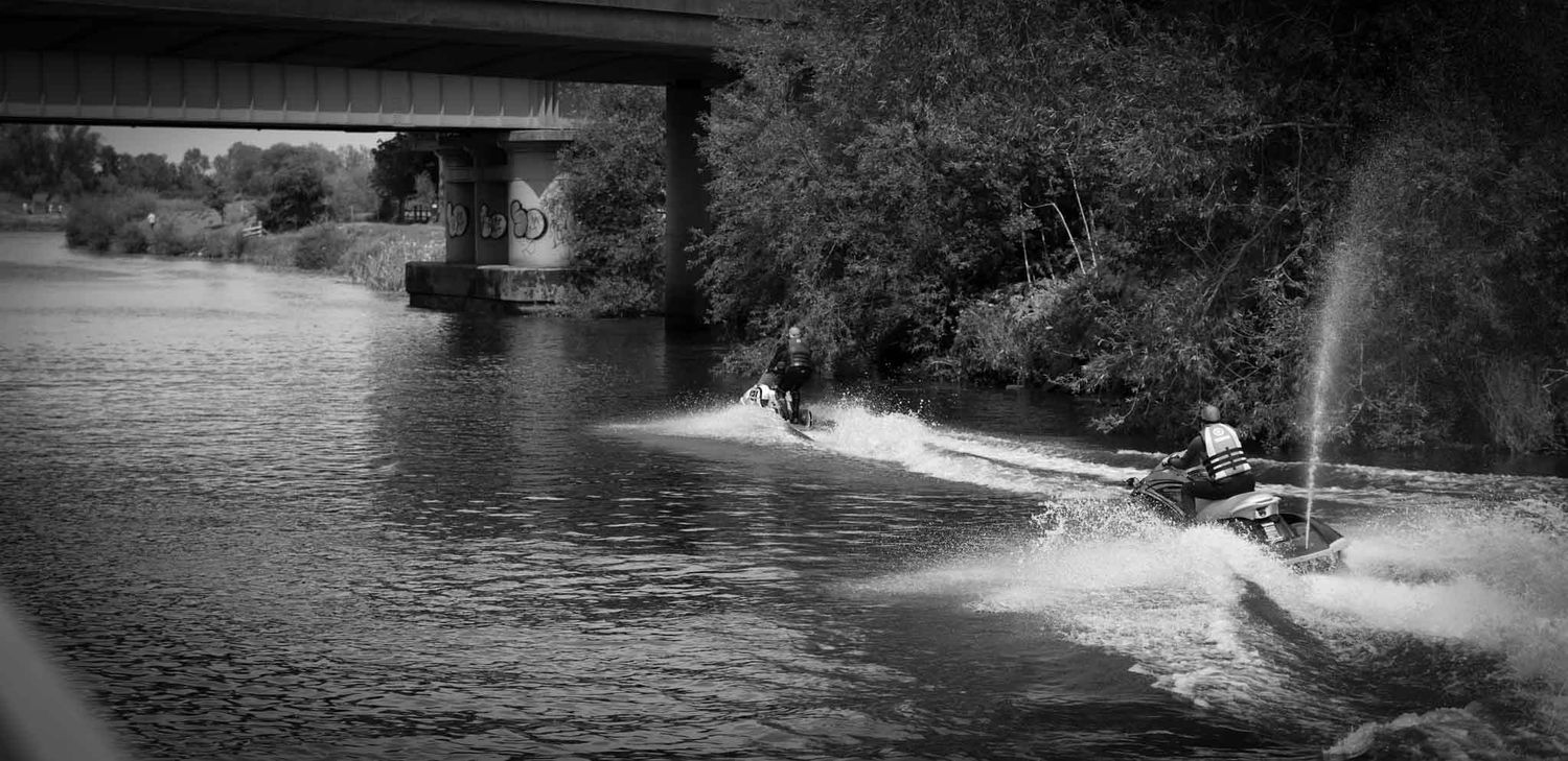 Two jet skiers on the River Bann.