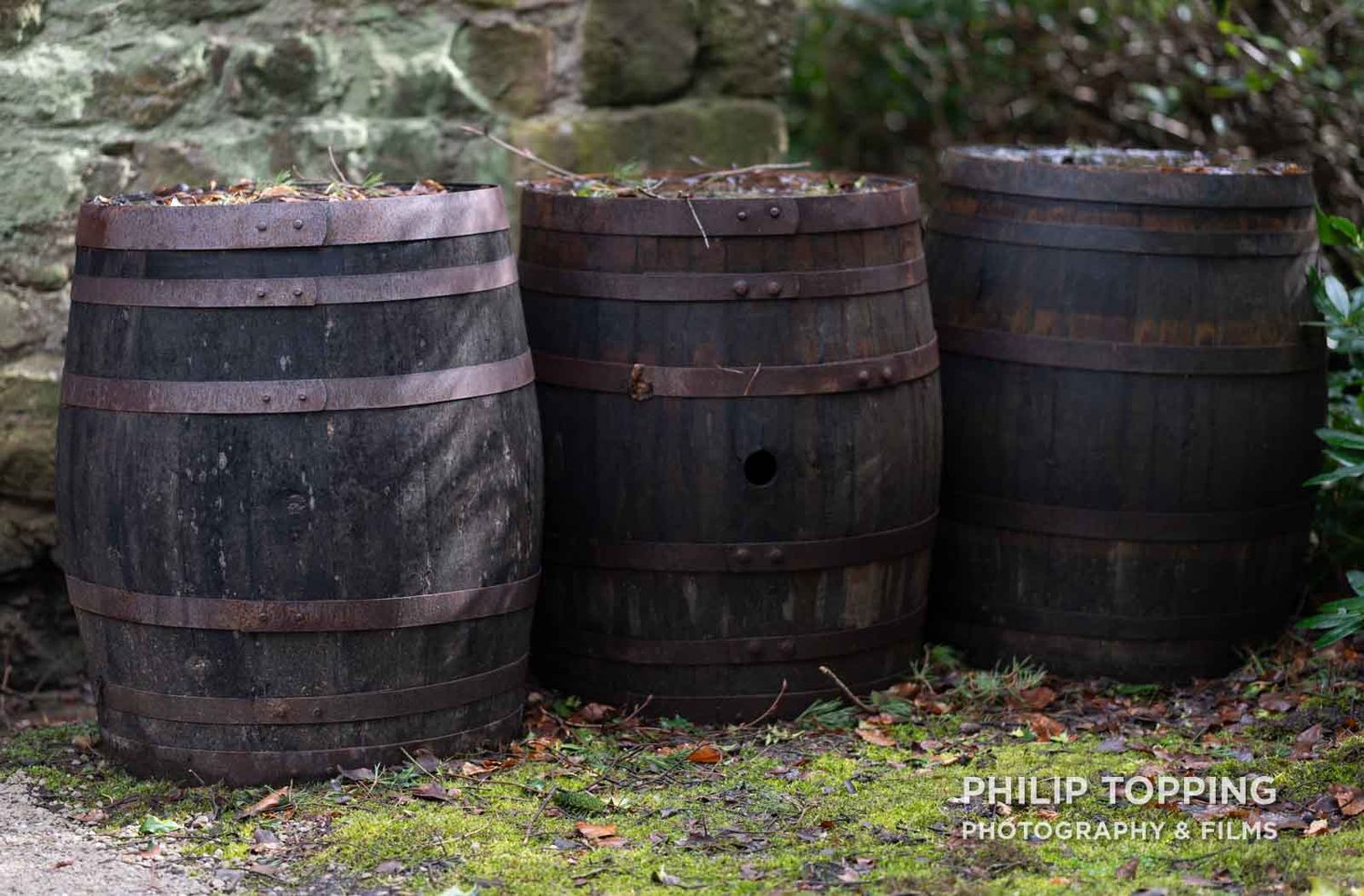 Three wooden barrels.