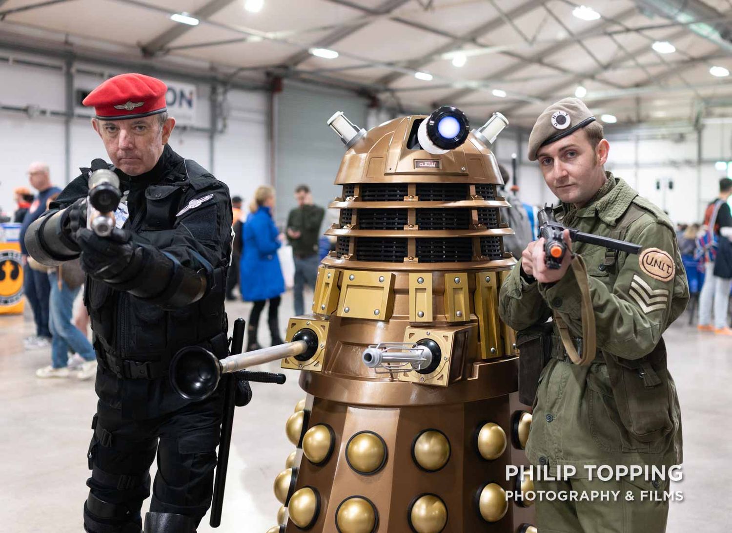 Cosplayers with a Dalek.
