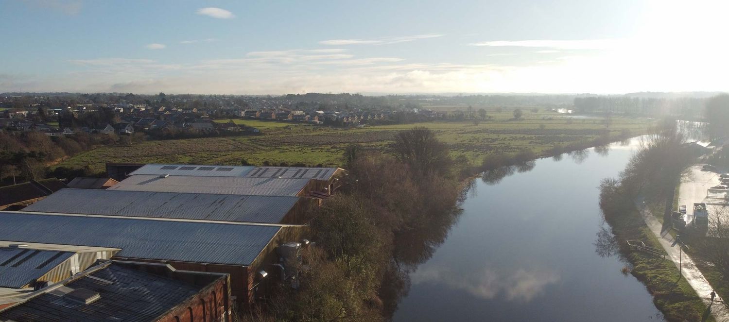 The river heads off into the distance with plenty of countryside on either side.