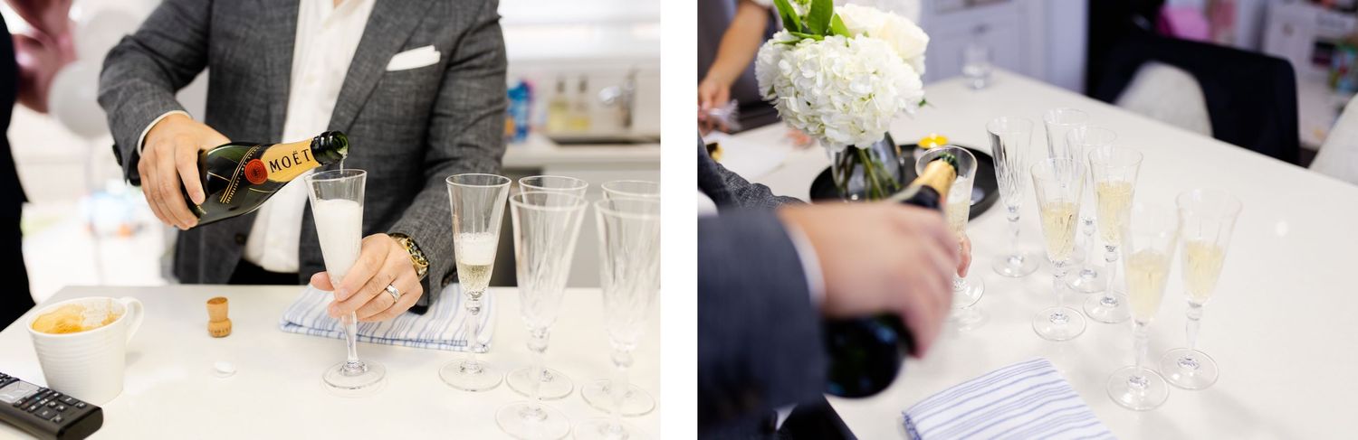 Person pouring champagne into glasses at an elegant celebration.