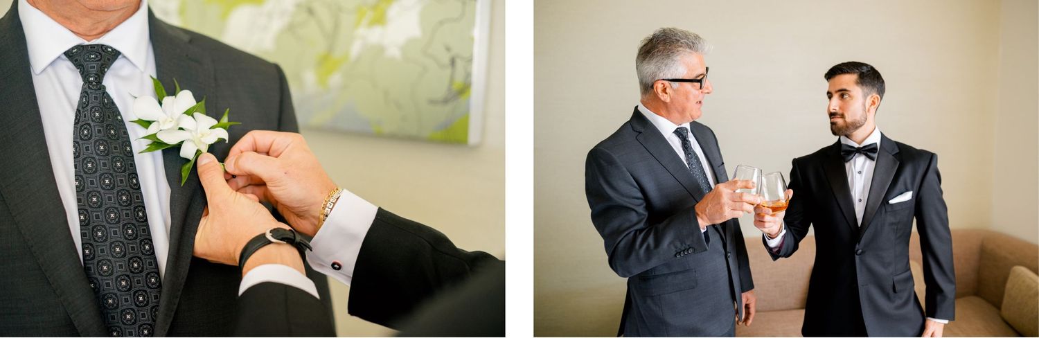 Men in suits adjusting boutonniere and having conversation during wedding preparation.