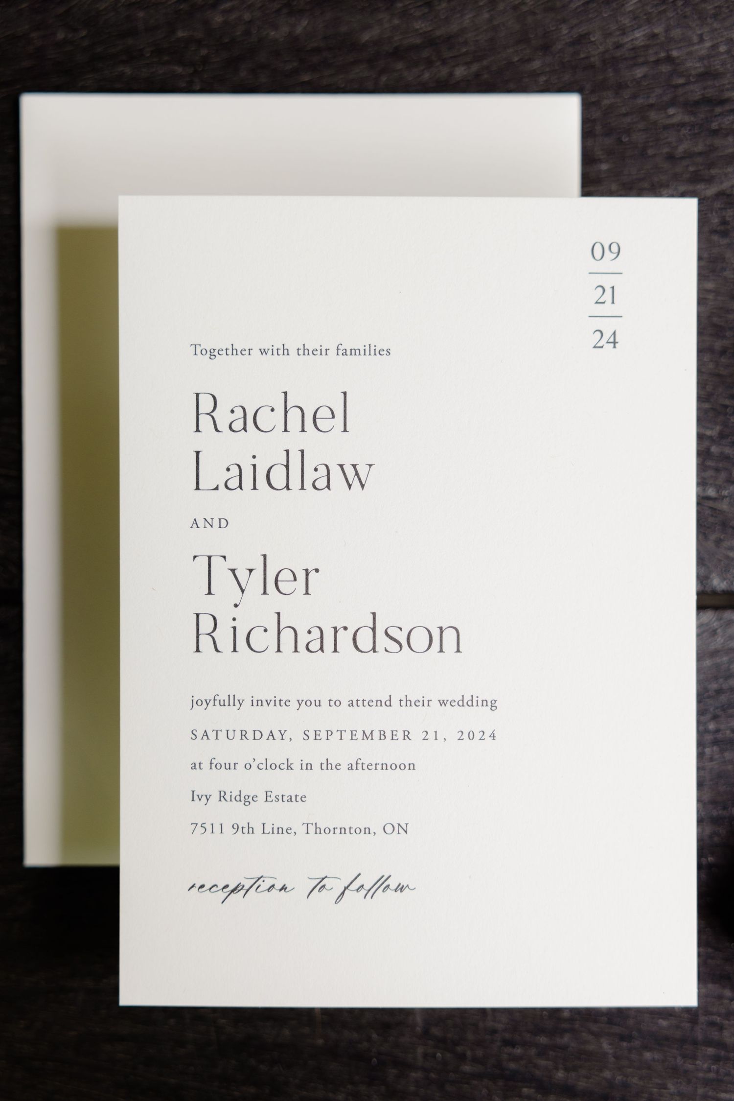Minimalist wedding invitation with elegant typography displaying date and venue details.