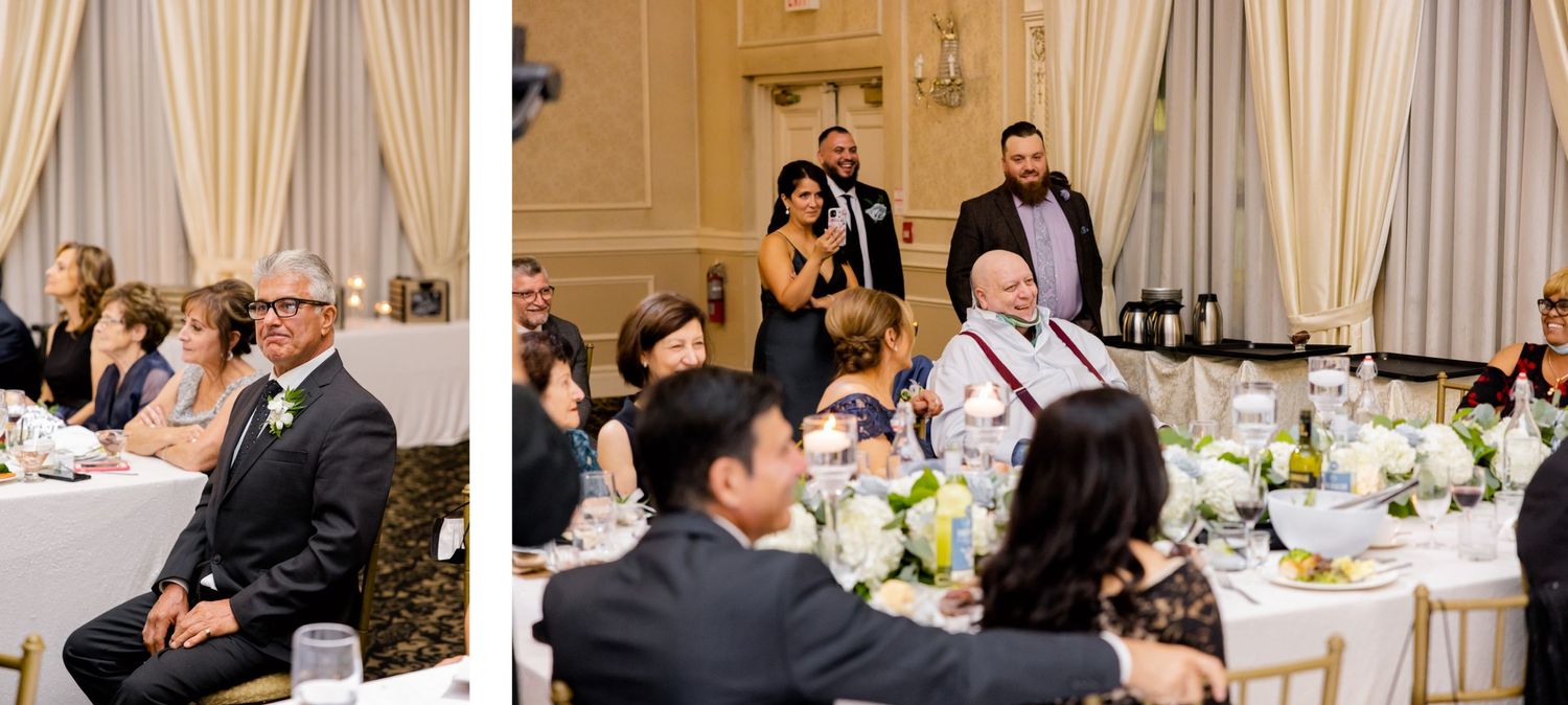Candid reception moments captured during wedding speeches in an elegant ballroom setting.