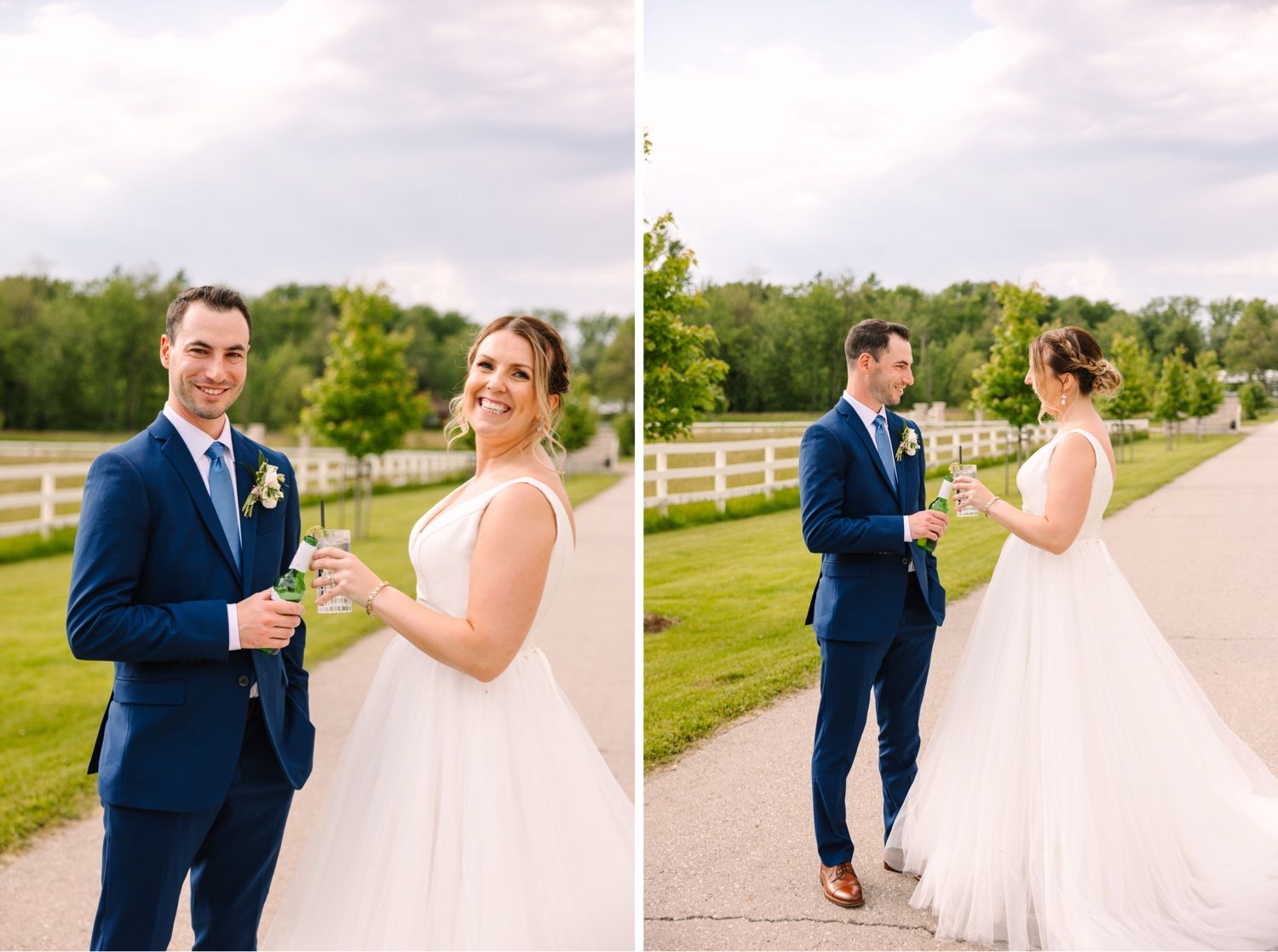 A wedding couple shares a joyful moment together on a path with white fencing and greenery in the background.