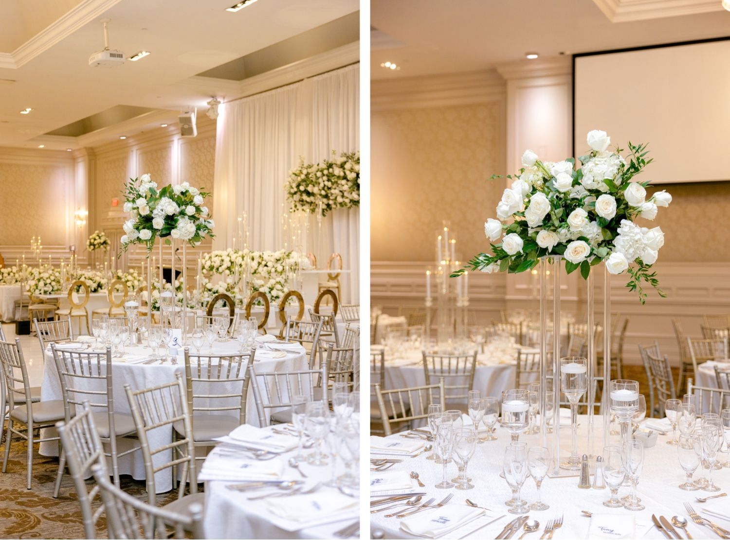Elegant wedding reception ballroom with white chiavari chairs and tall floral centerpieces in white and gold decor.