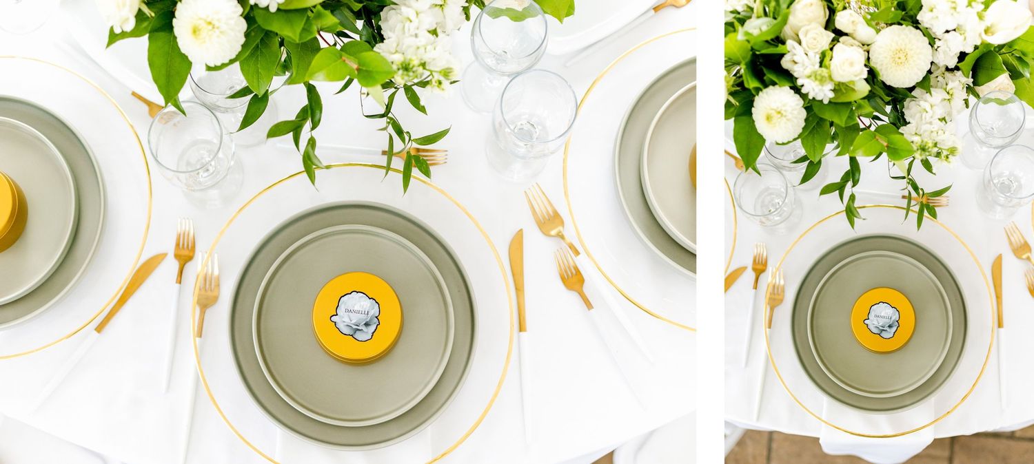 Elegant place settings with gold flatware and yellow desserts on gray plates.